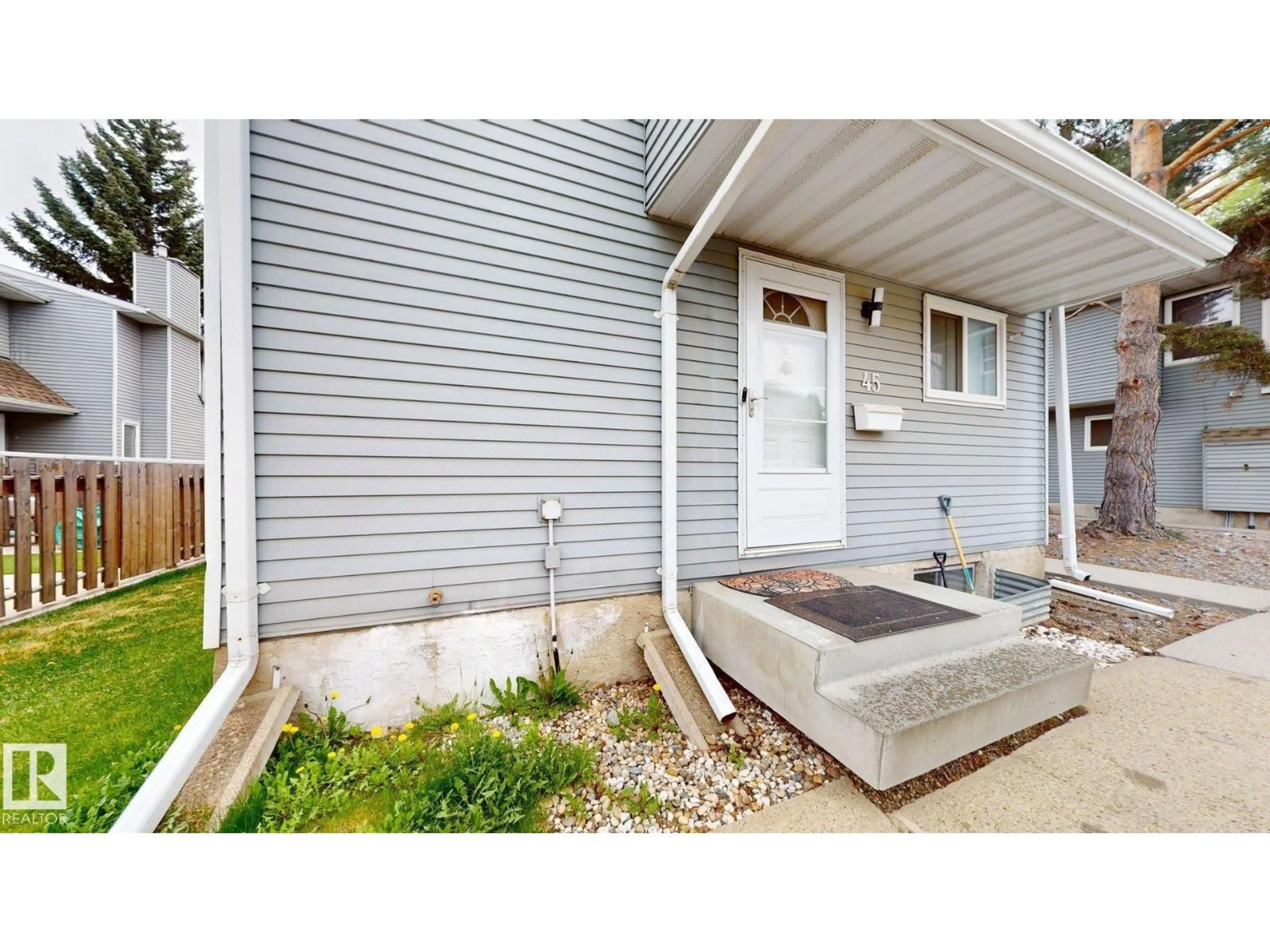 Home with vinyl exterior material, street for #45 - 4403 RIVERBEND RD, Edmonton Alberta T6H5S9