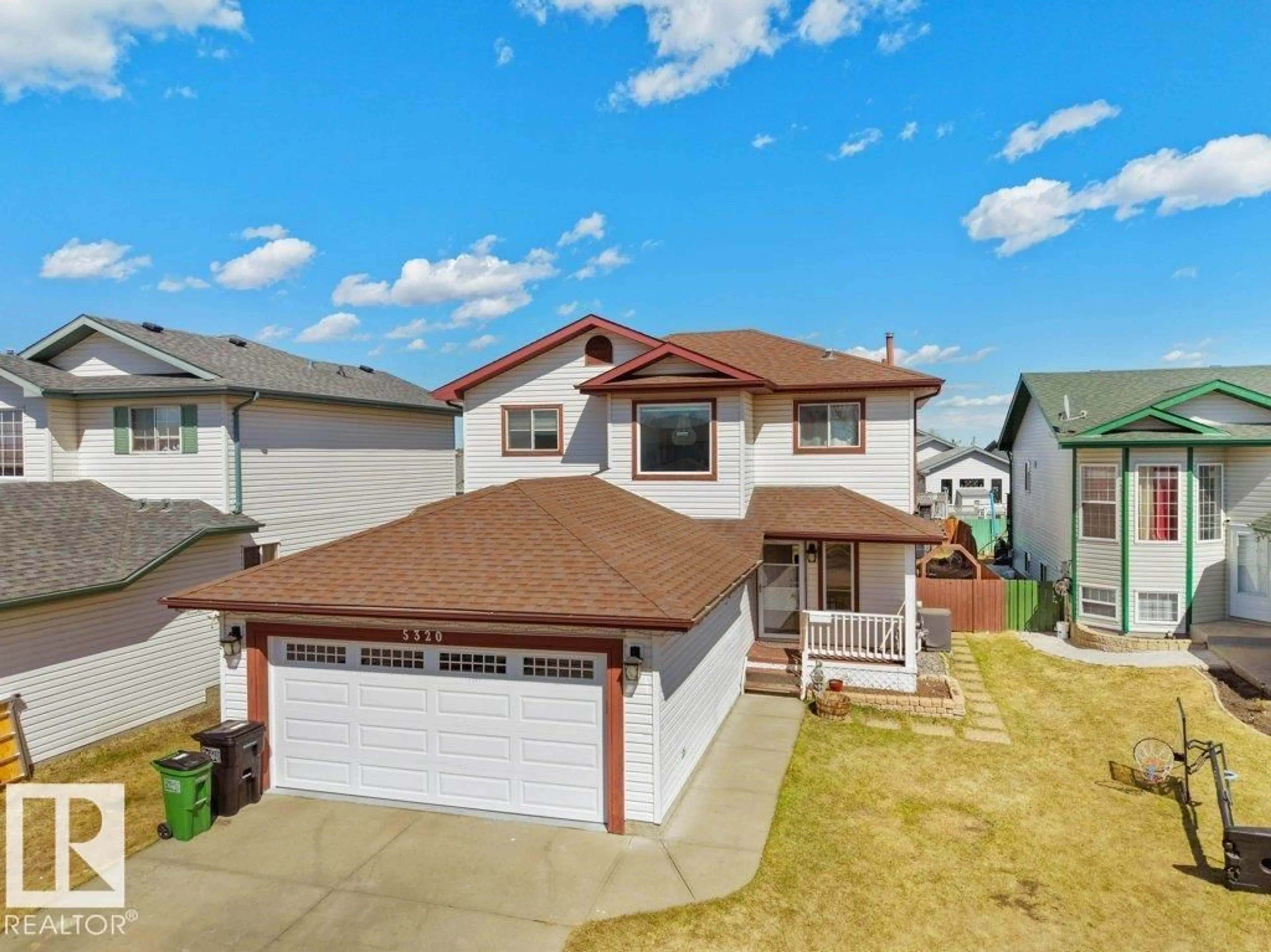 A pic from outside/outdoor area/front of a property/back of a property/a pic from drone, street for 5320 156 AV, Edmonton Alberta T5Y2T3