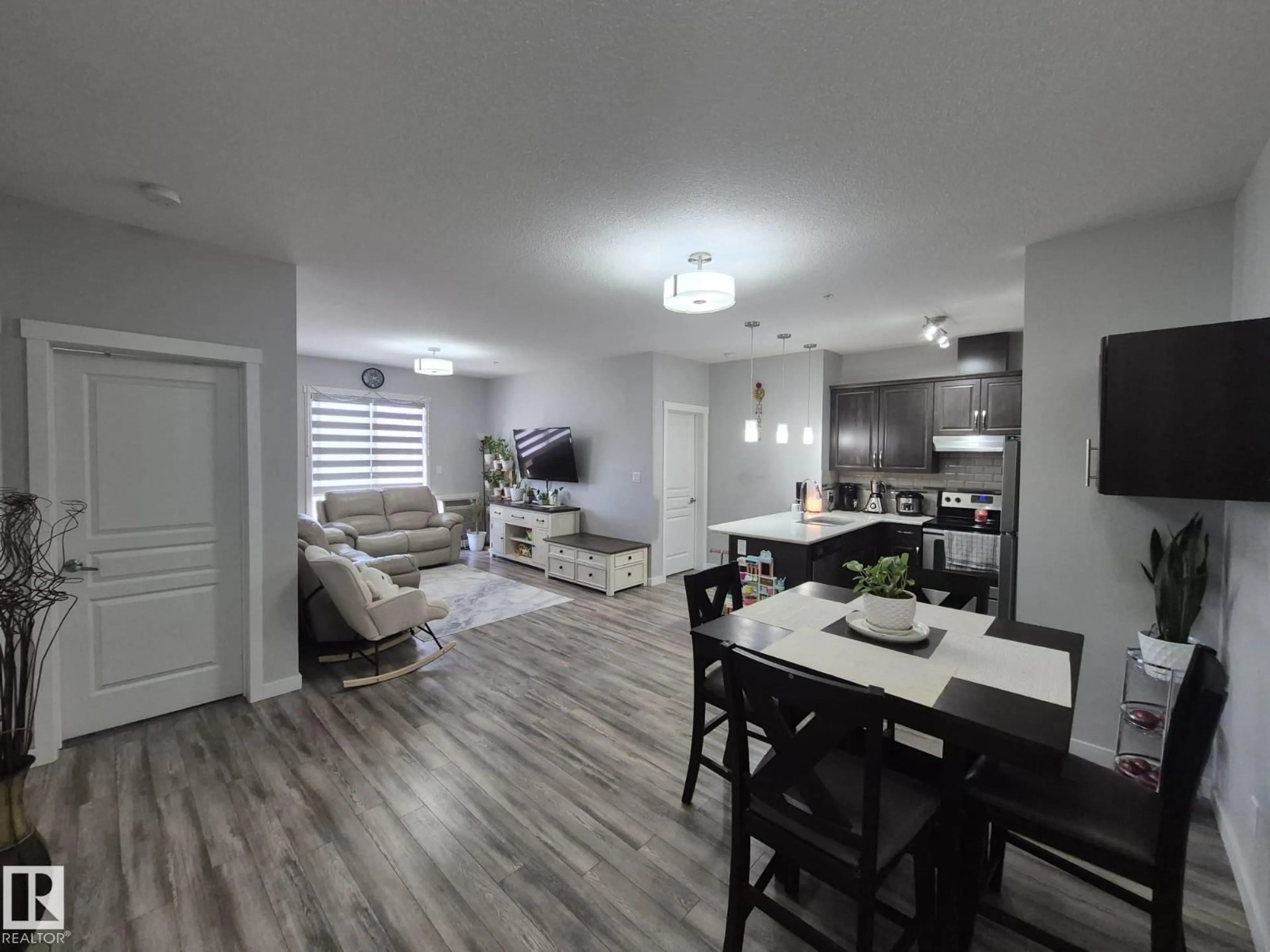 Open concept kitchen, wood/laminate floor for #303 - 812 WELSH DR, Edmonton Alberta T6X1Y7