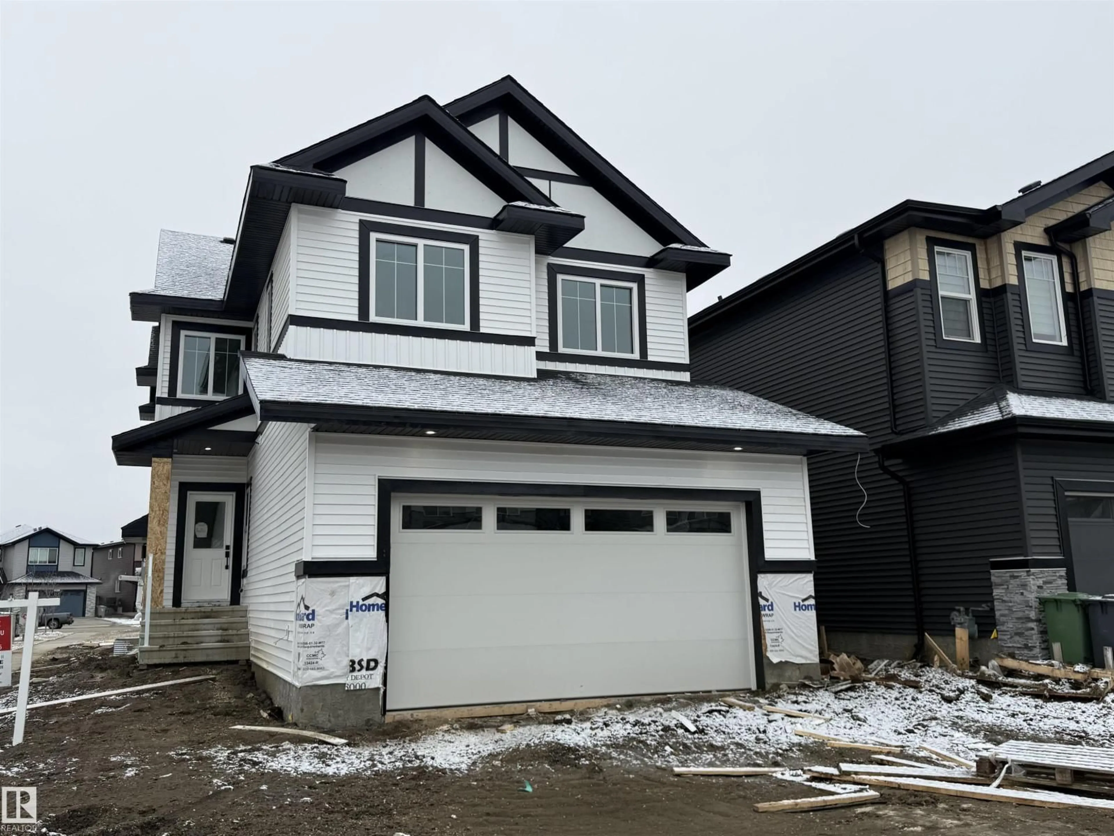 Home with vinyl exterior material, street for 5802 PELTIER CL, Beaumont Alberta T4X2Y1