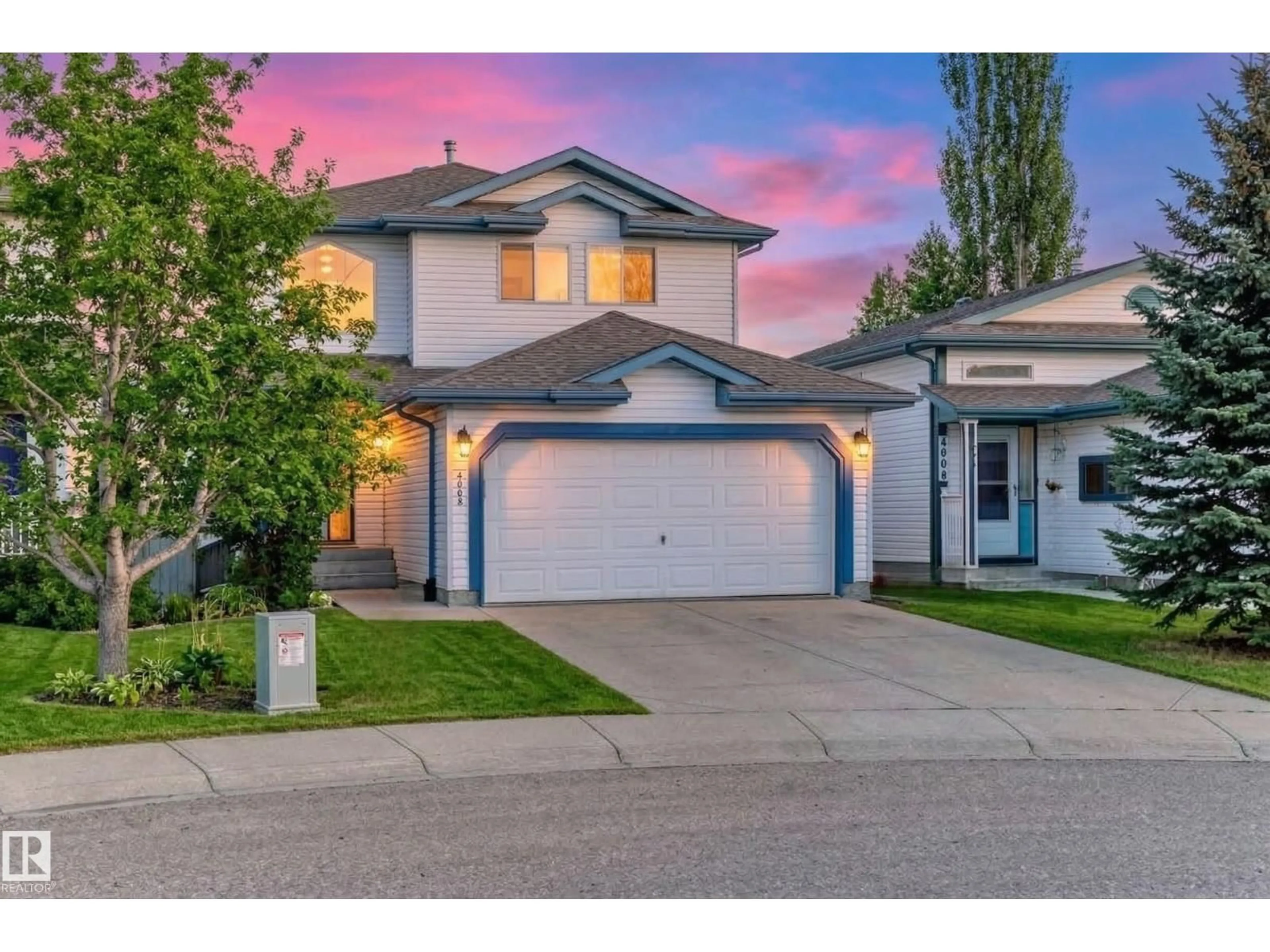 Home with vinyl exterior material, street for 4008 37 AV NW, Edmonton Alberta T6L7B2