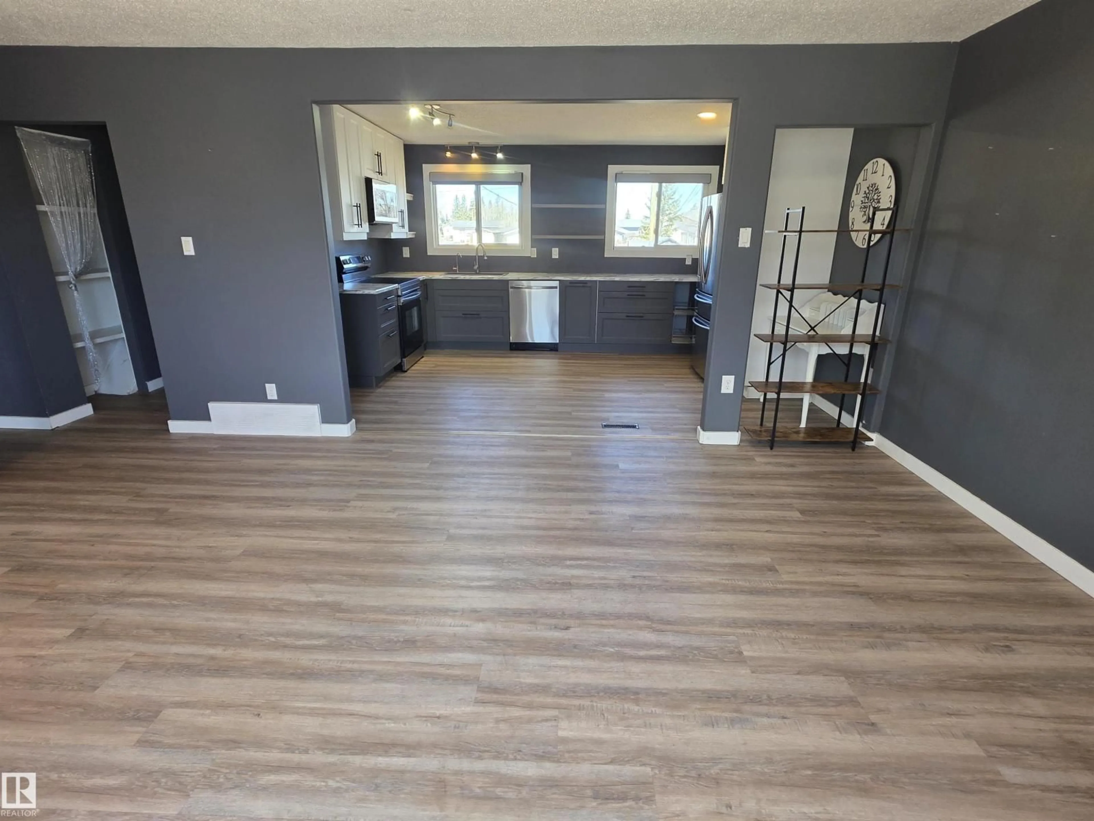 Open concept kitchen, wood/laminate floor for 4924 50A AV, Entwistle Alberta T0E0S0