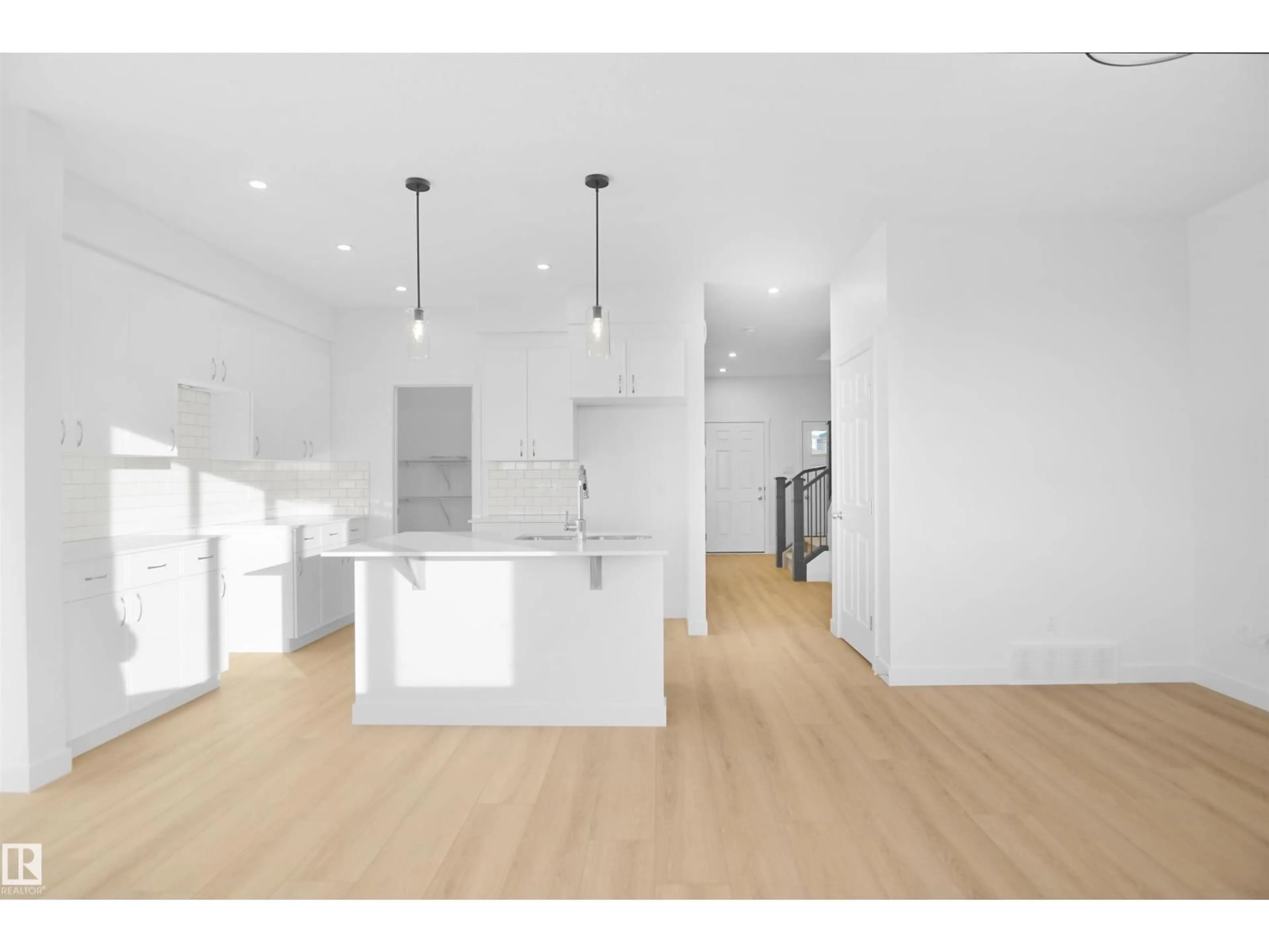 Open concept kitchen, wood/laminate floor for NW - 1932 210 ST, Edmonton Alberta T6M1P7