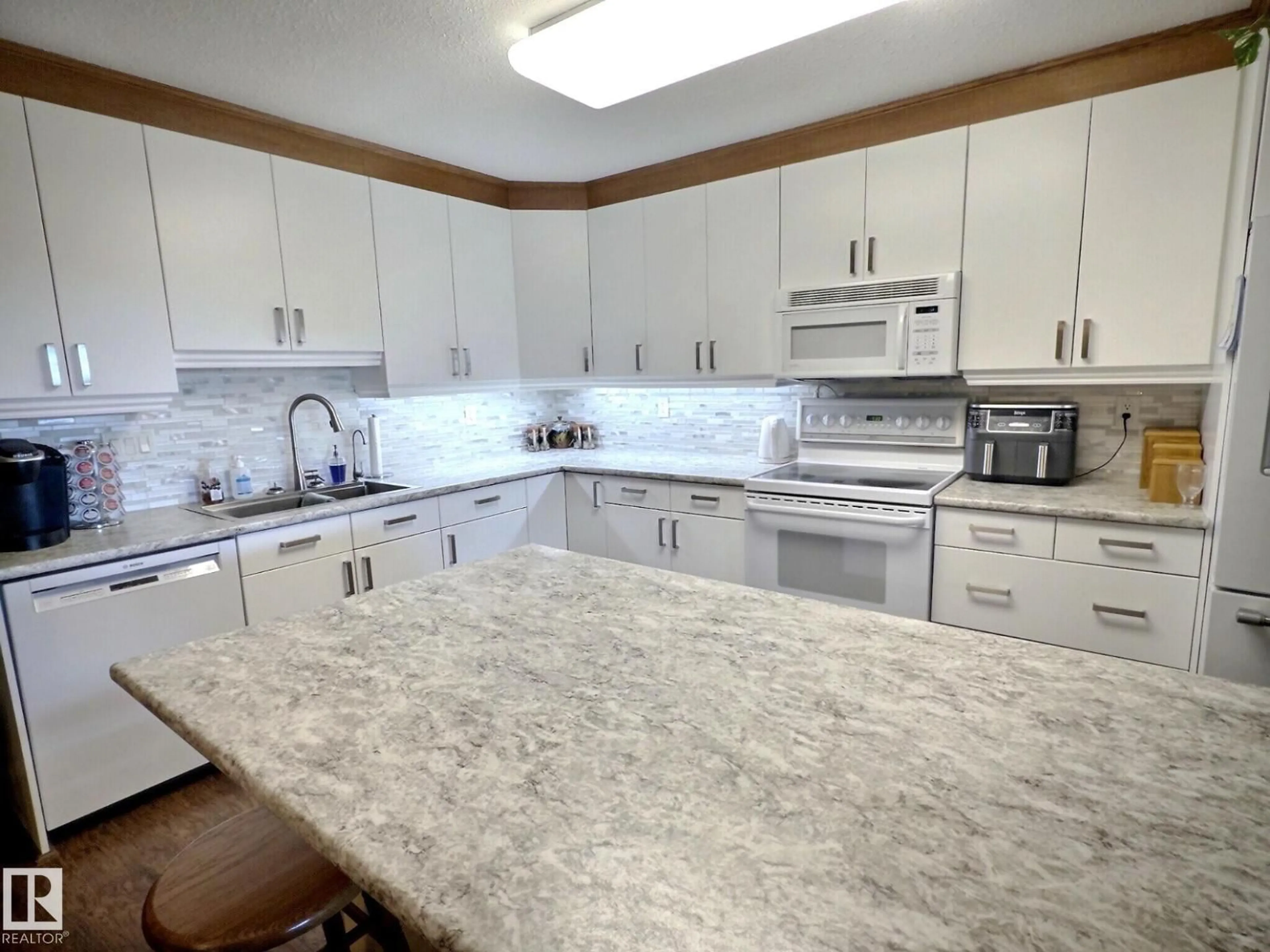 Open concept kitchen, ceramic/tile floor for #108 - 8922 156 ST, Edmonton Alberta T5R5Z3