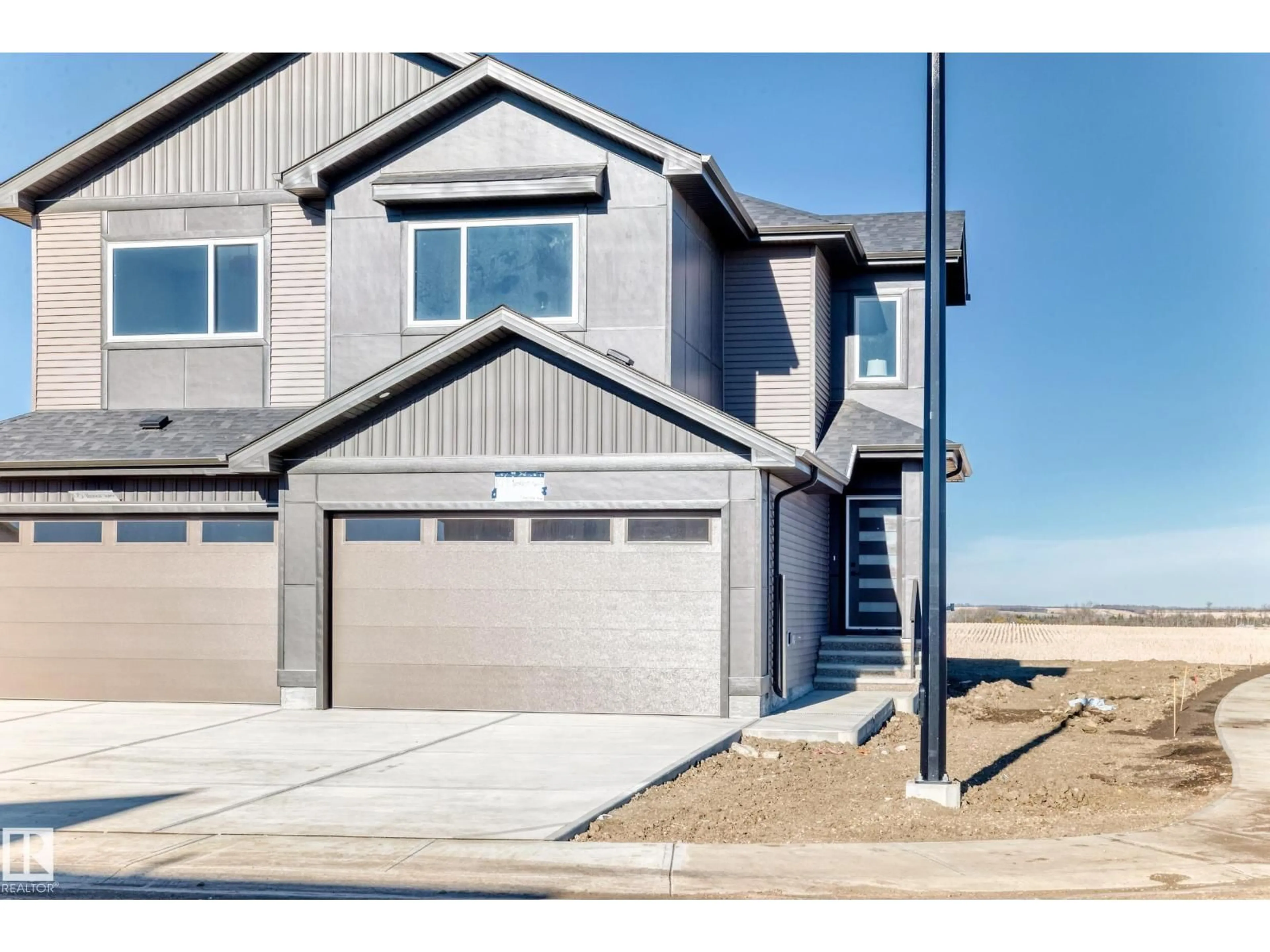 Home with vinyl exterior material, street for 107 PATRIOT WY, Spruce Grove Alberta T7X4E8