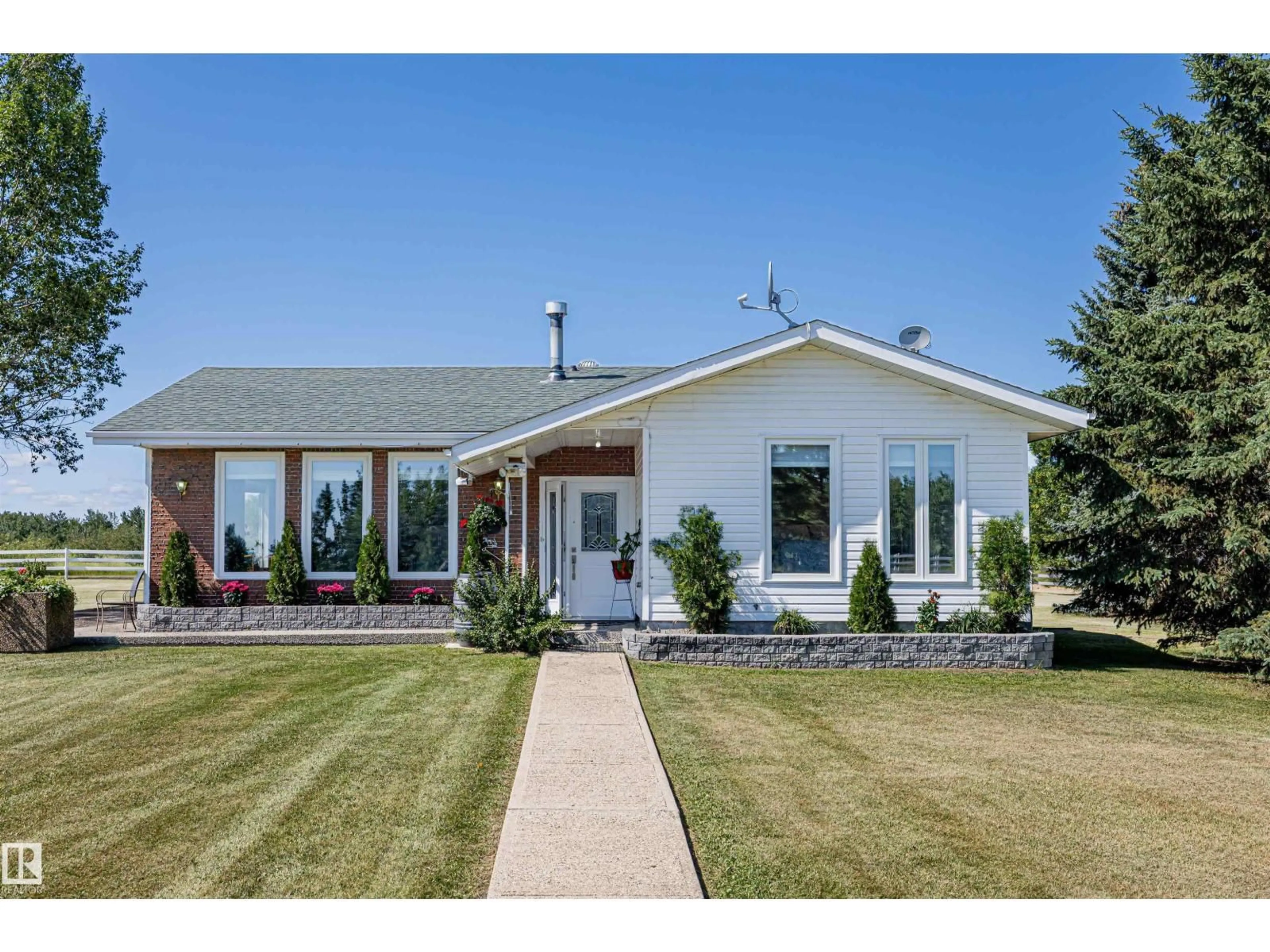Home with vinyl exterior material, street for 21341 TWP ROAD 534, Rural Strathcona County Alberta T8G2B2