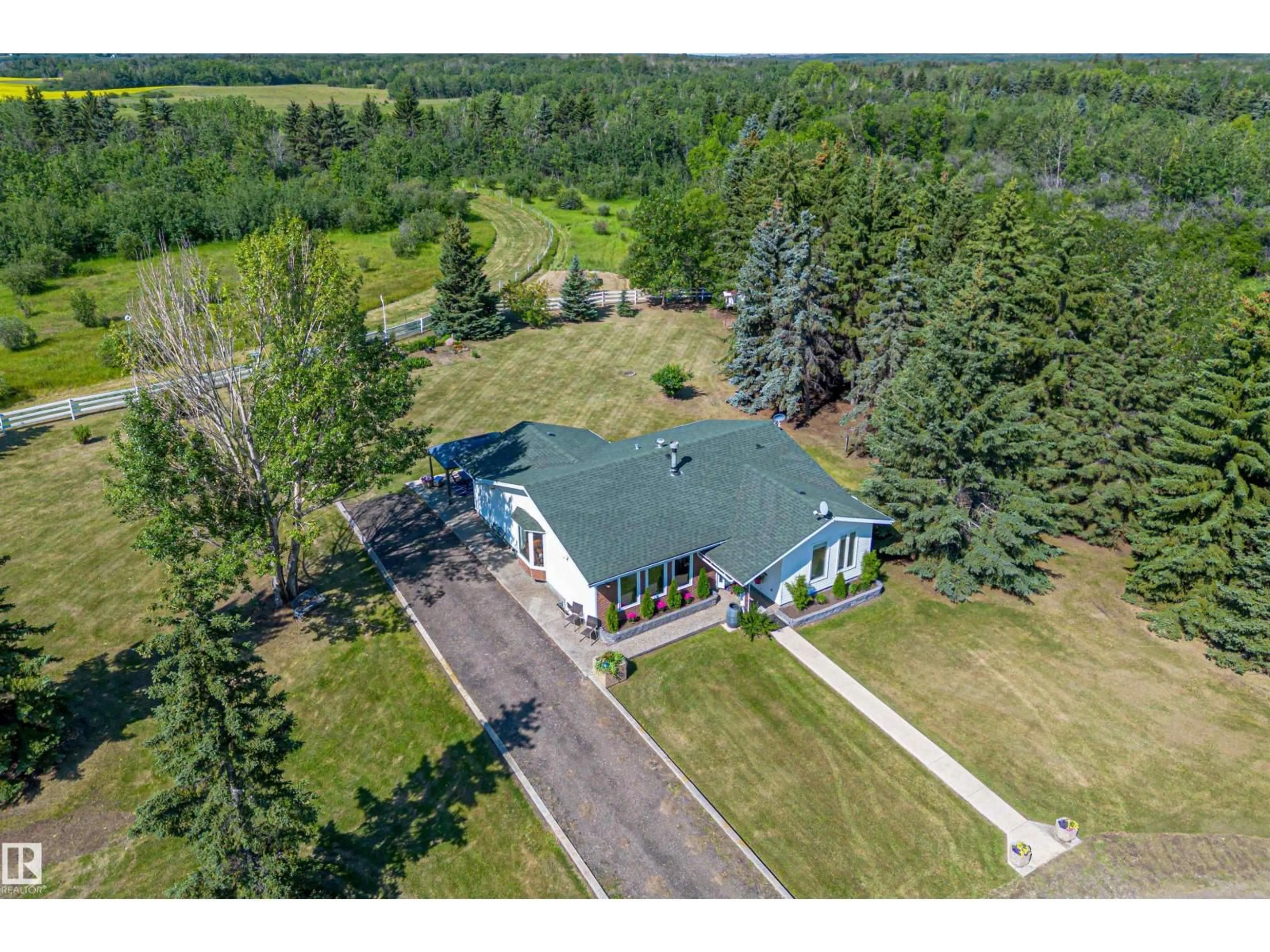 A pic from outside/outdoor area/front of a property/back of a property/a pic from drone, unknown for 21341 TWP ROAD 534, Rural Strathcona County Alberta T8G2B2