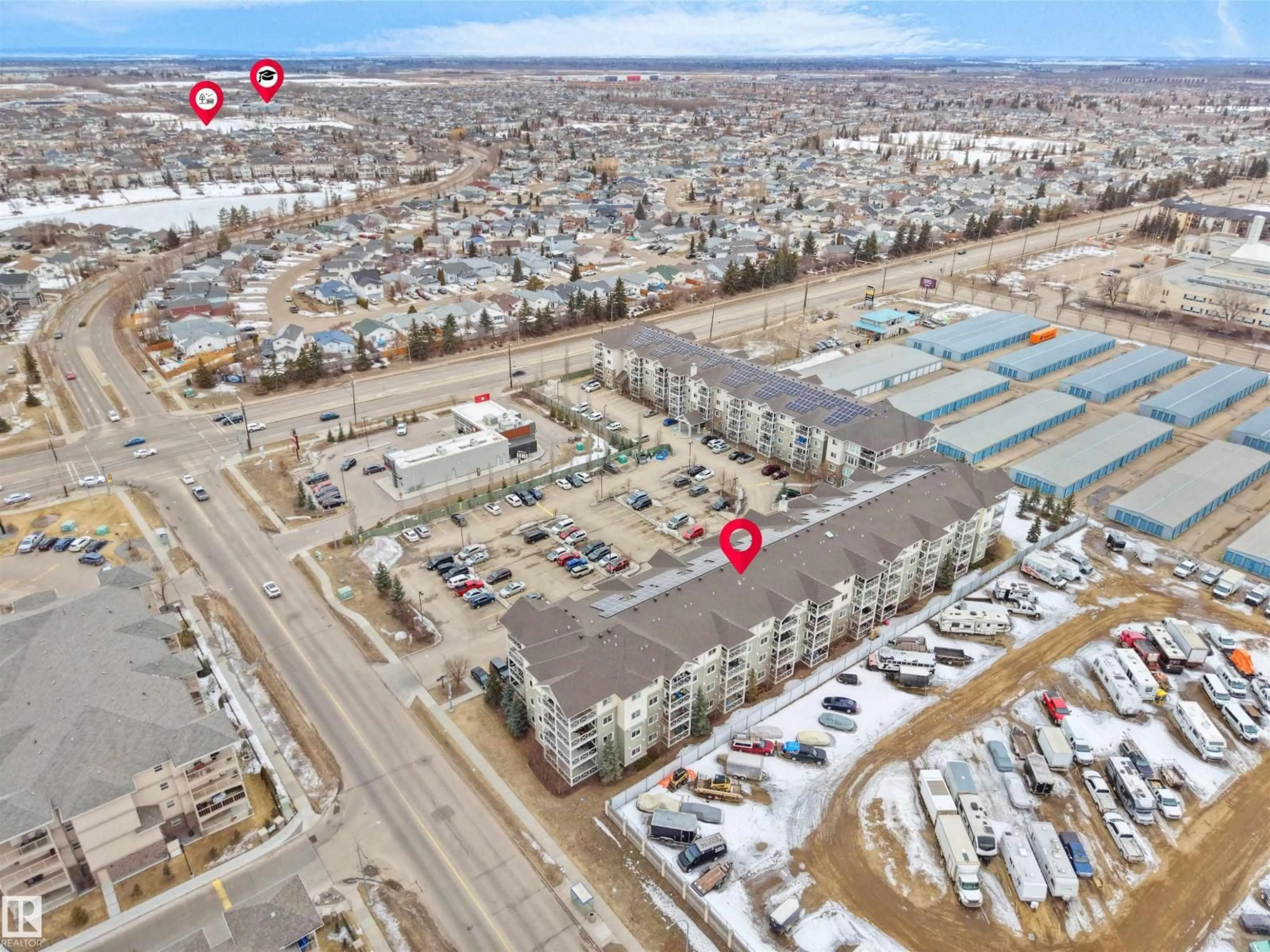 A pic from outside/outdoor area/front of a property/back of a property/a pic from drone, street for #106 - 12660 142 AVENUE AV, Edmonton Alberta T5X0J5