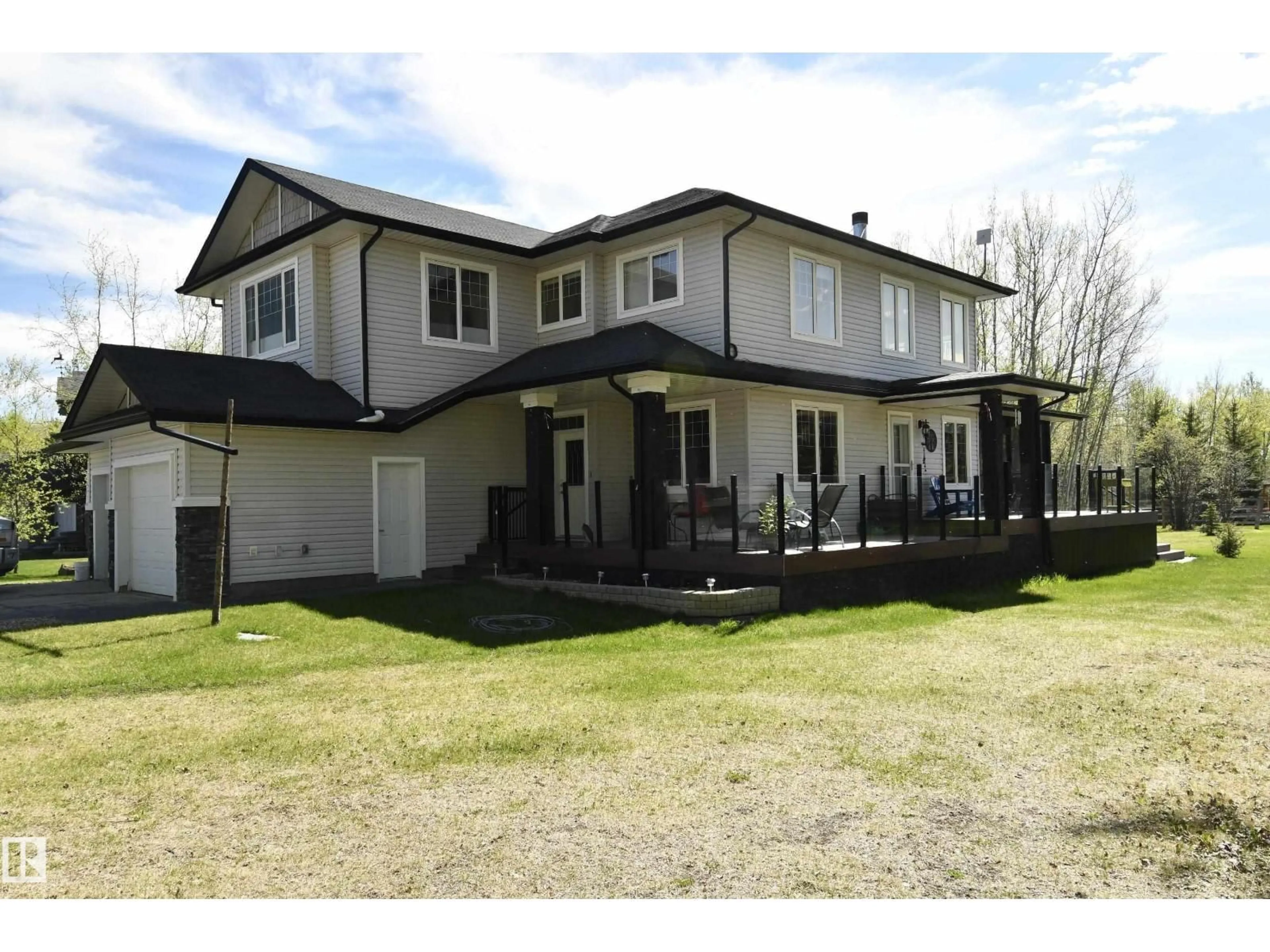 A pic from outside/outdoor area/front of a property/back of a property/a pic from drone, building for 90 47411 RGE RD 14, Rural Leduc County Alberta T0C2P0