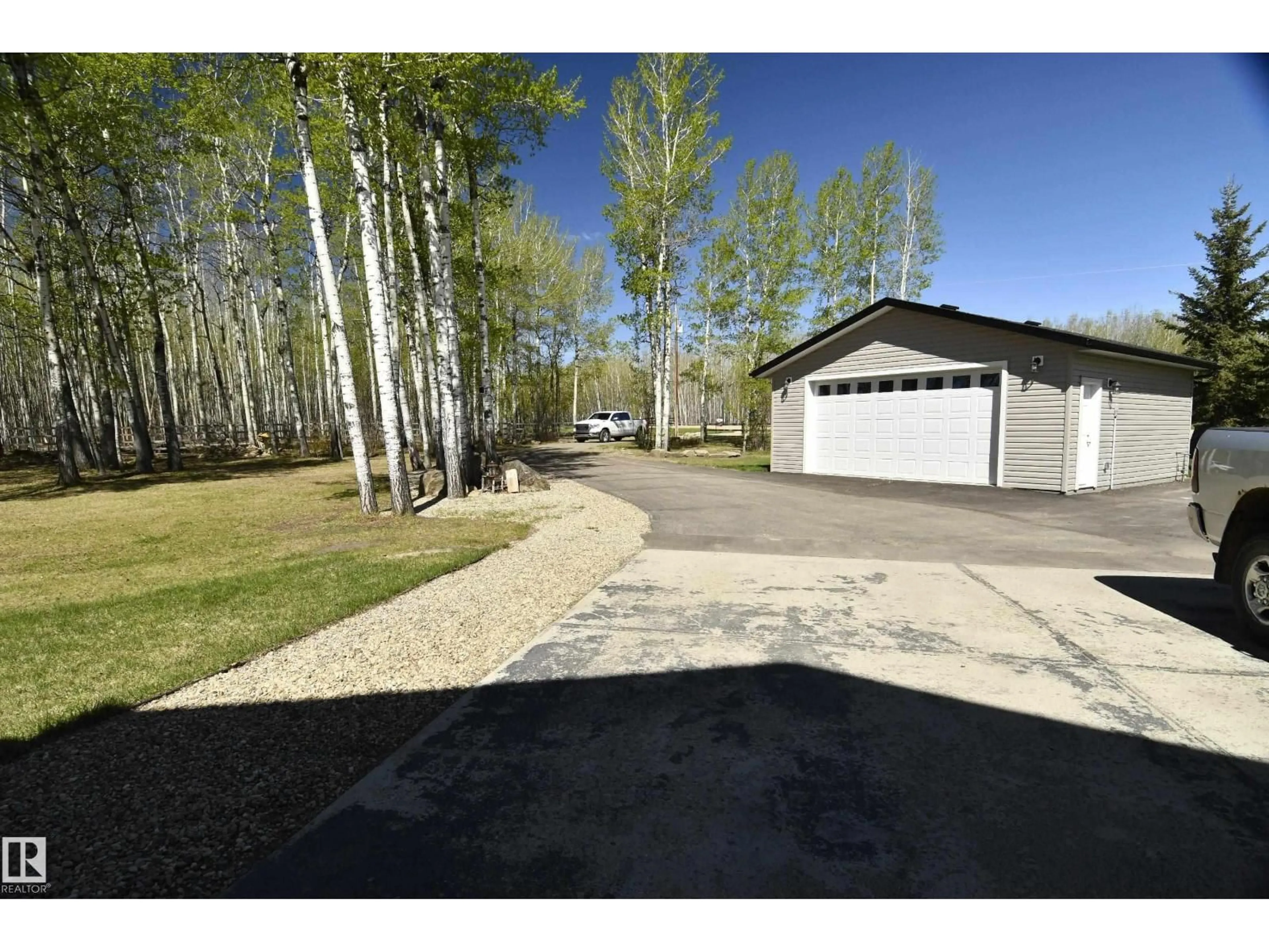 A pic from outside/outdoor area/front of a property/back of a property/a pic from drone, street for 90 47411 RGE RD 14, Rural Leduc County Alberta T0C2P0