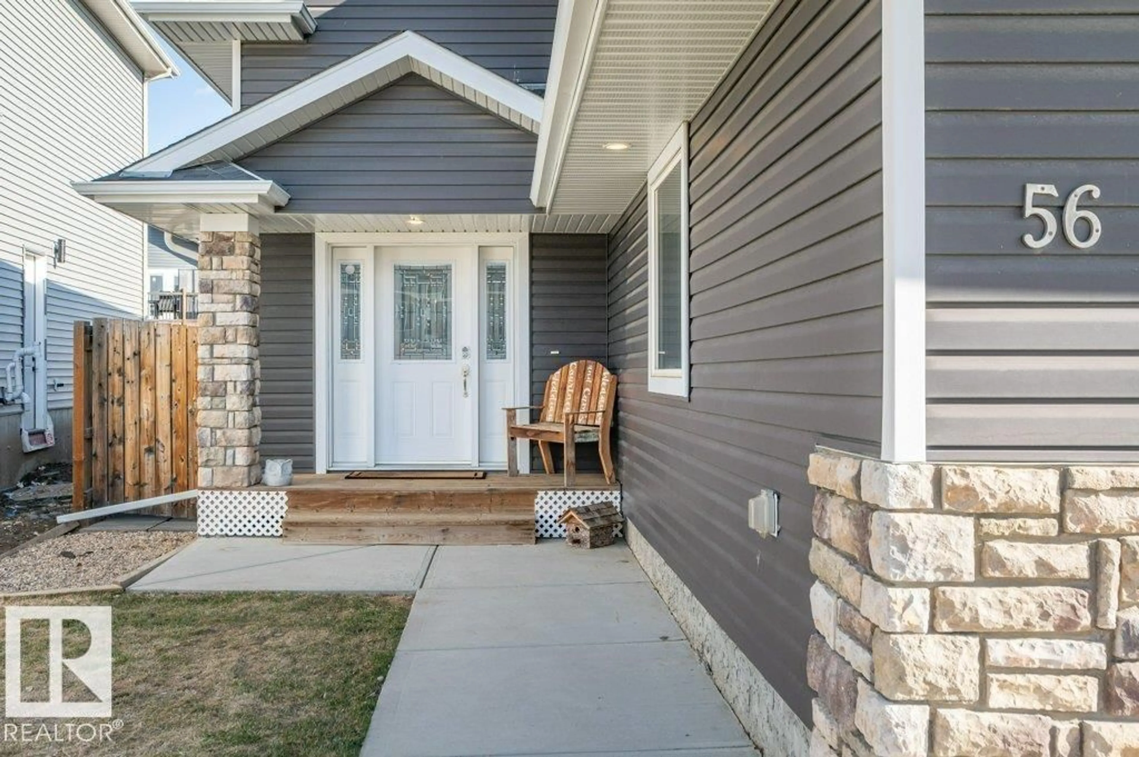 Home with vinyl exterior material, street for 56 LANDING TRAIL DR, Gibbons Alberta T0A1N0