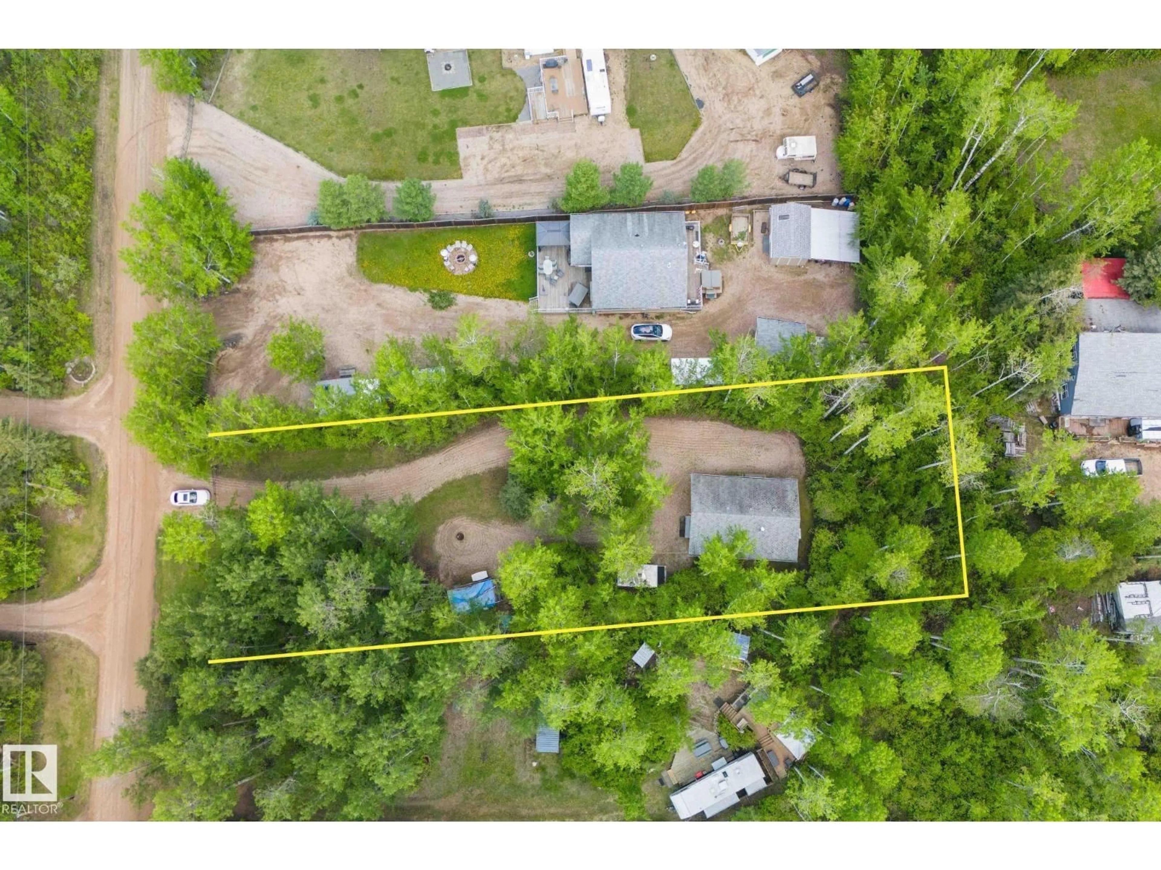 A pic from outside/outdoor area/front of a property/back of a property/a pic from drone, forest/trees view for 59316 - 37 RANGE ROAD 54, Rural Barrhead County Alberta T0G2G0