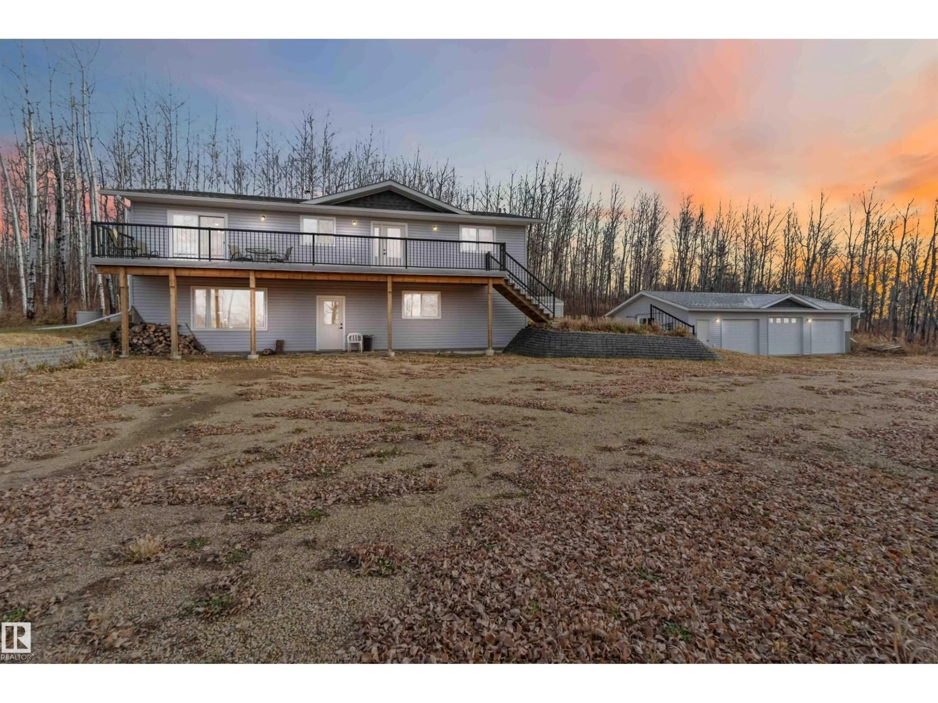 A pic from outside/outdoor area/front of a property/back of a property/a pic from drone, building for 59209 - 30 HWY 18, Rural Barrhead County Alberta T7N1N3