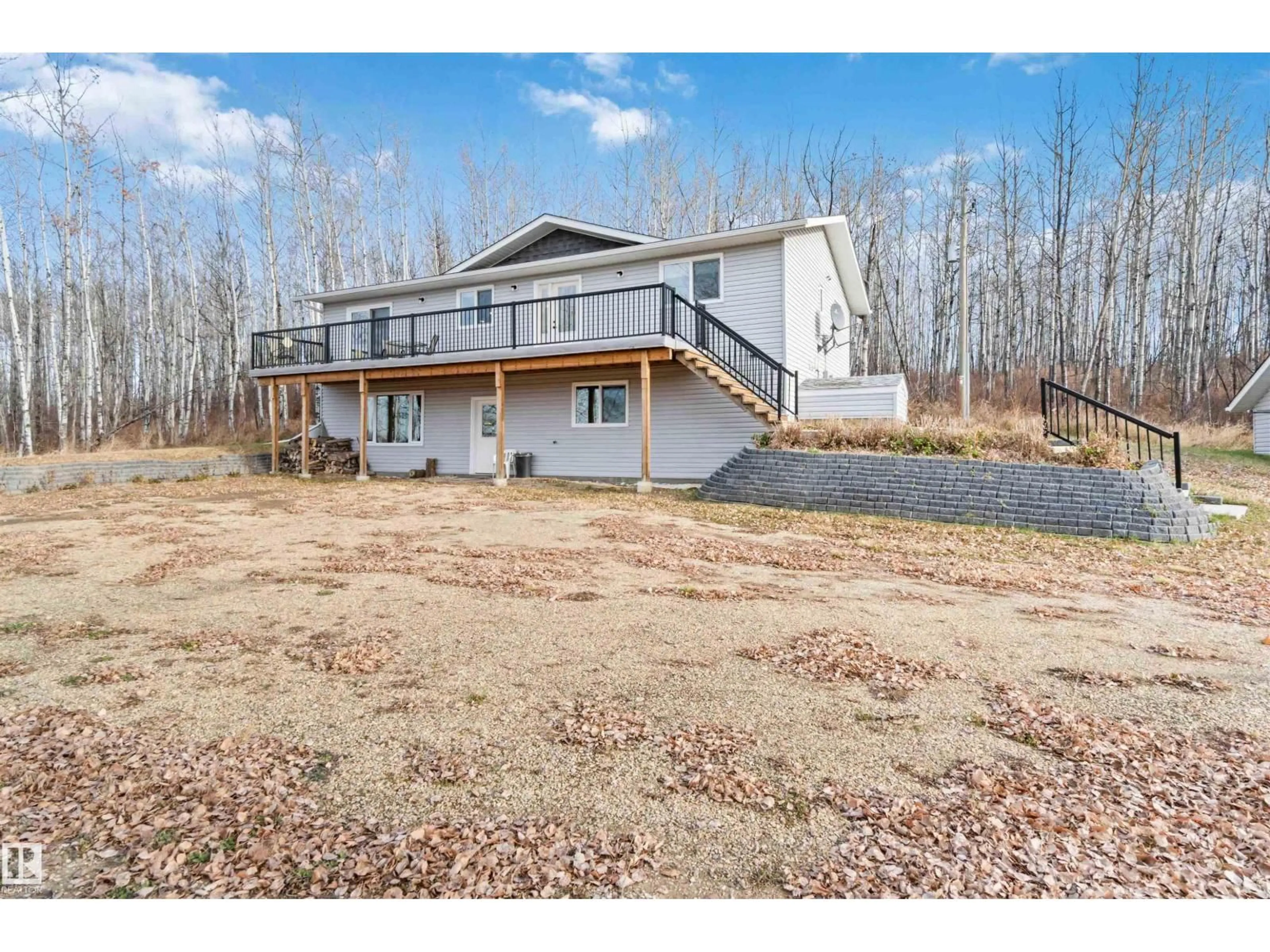 A pic from outside/outdoor area/front of a property/back of a property/a pic from drone, unknown for 59209 - 30 HWY 18, Rural Barrhead County Alberta T7N1N3