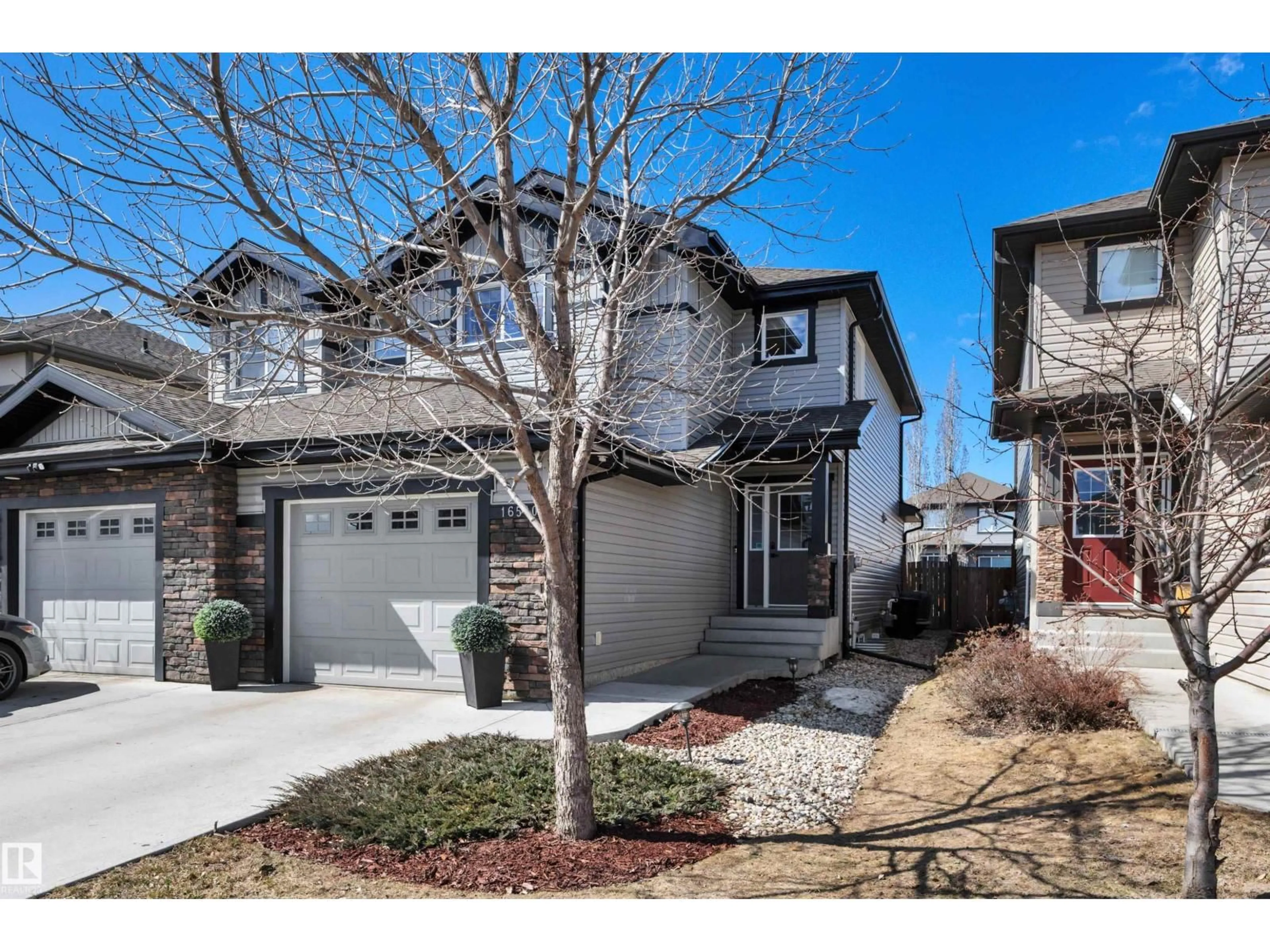 Home with brick exterior material, street for NW - 16510 135 ST, Edmonton Alberta T6V0G7