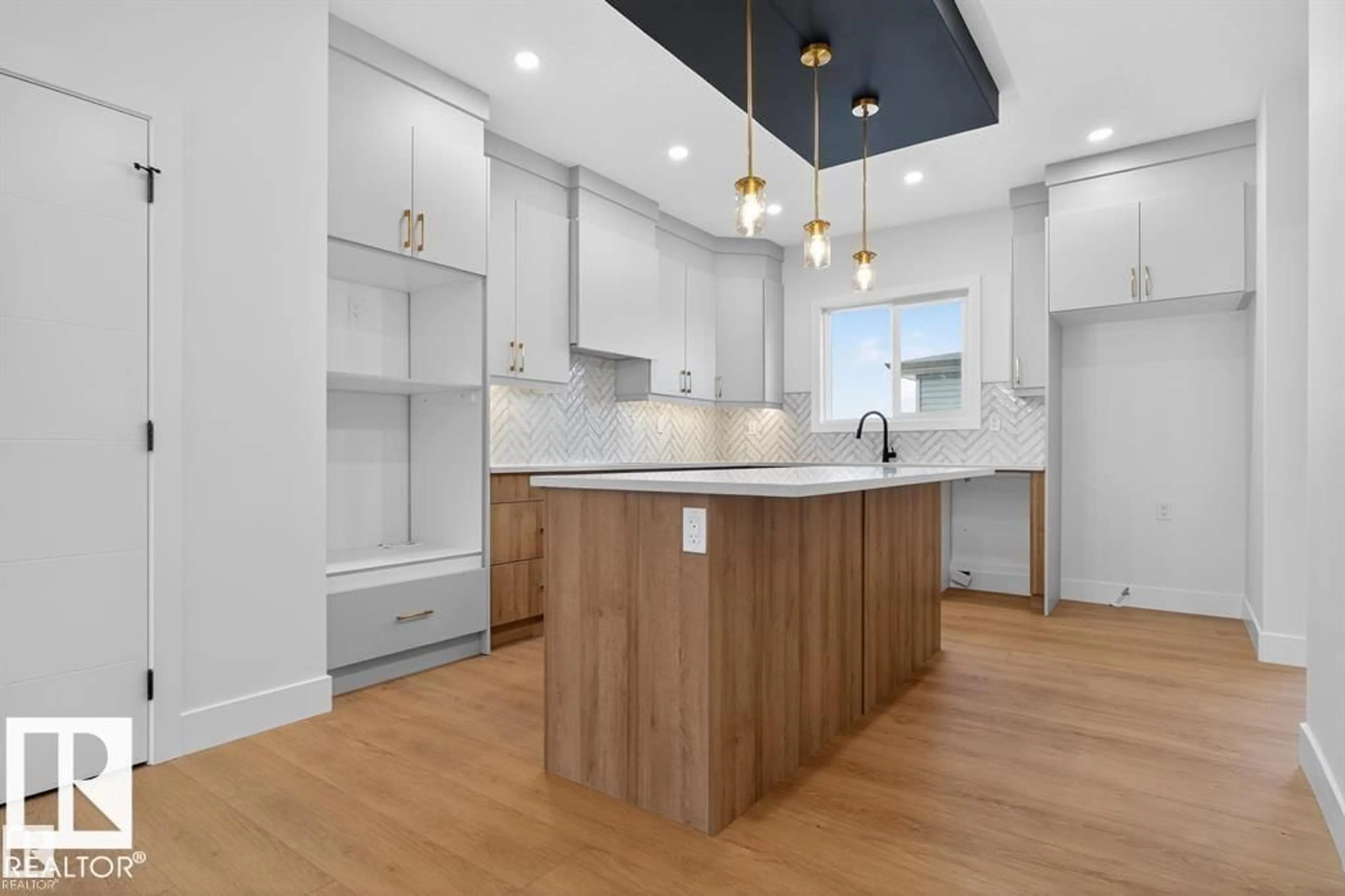 Open concept kitchen, wood/laminate floor for 55 ROSA CR, St. Albert Alberta T8N8B7