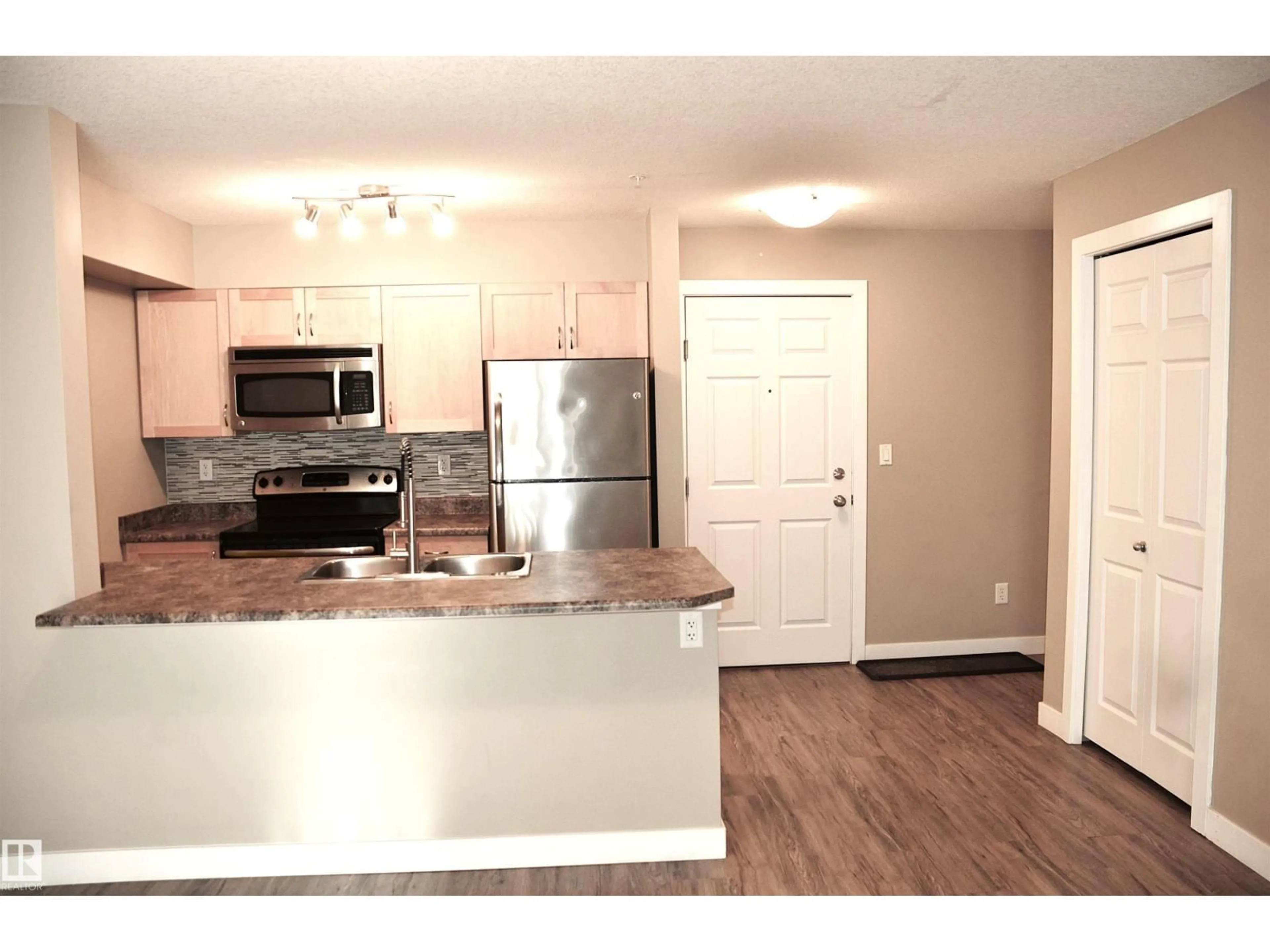 Open concept kitchen, unknown for #103 - 920 156 ST, Edmonton Alberta T6R0N6