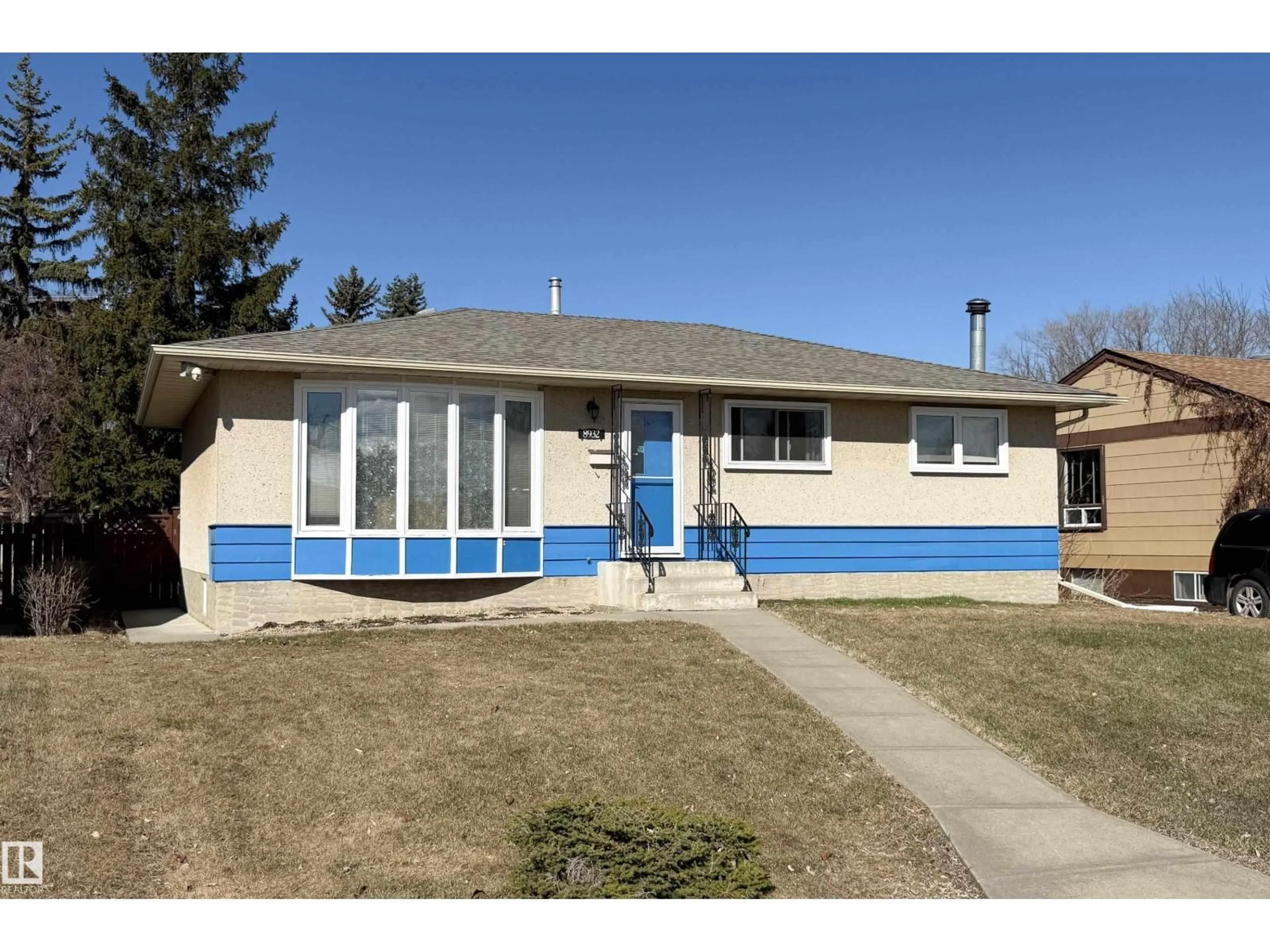 Home with vinyl exterior material, street for NW - 8932 154 ST, Edmonton Alberta T5R1S8