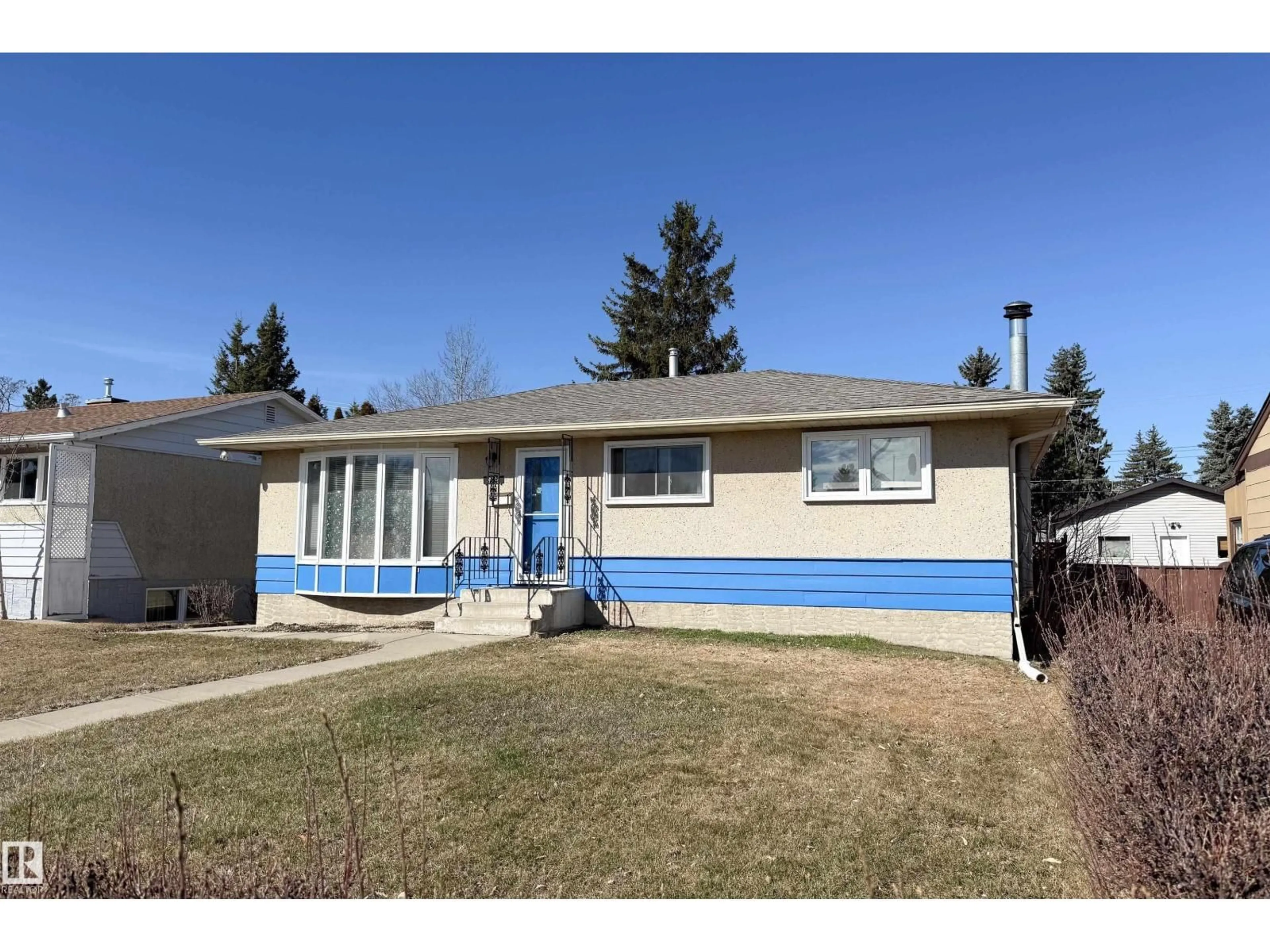 Home with vinyl exterior material, street for NW - 8932 154 ST, Edmonton Alberta T5R1S8