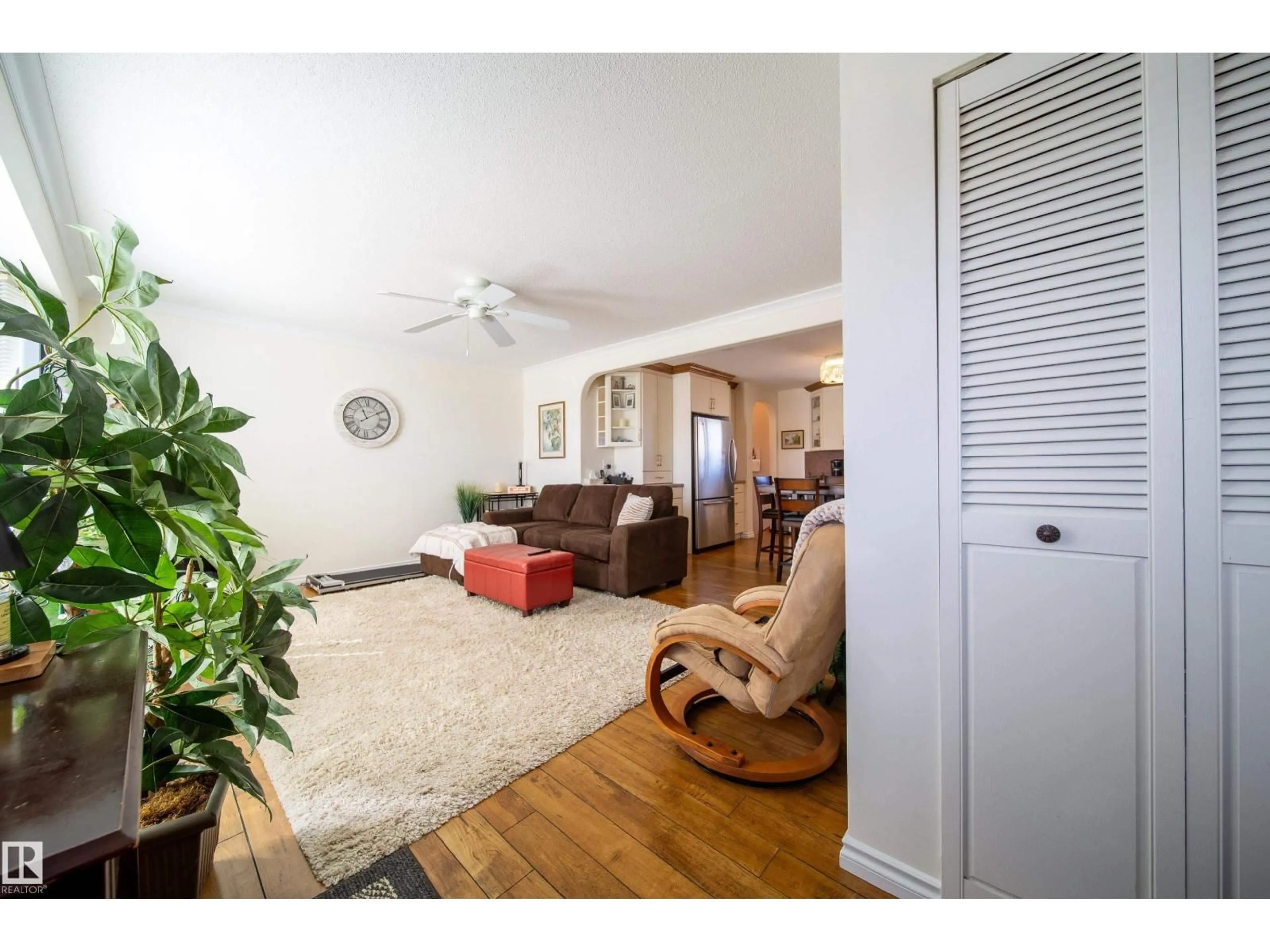 Living room with furniture, wood/laminate floor for NW - 8932 154 ST, Edmonton Alberta T5R1S8