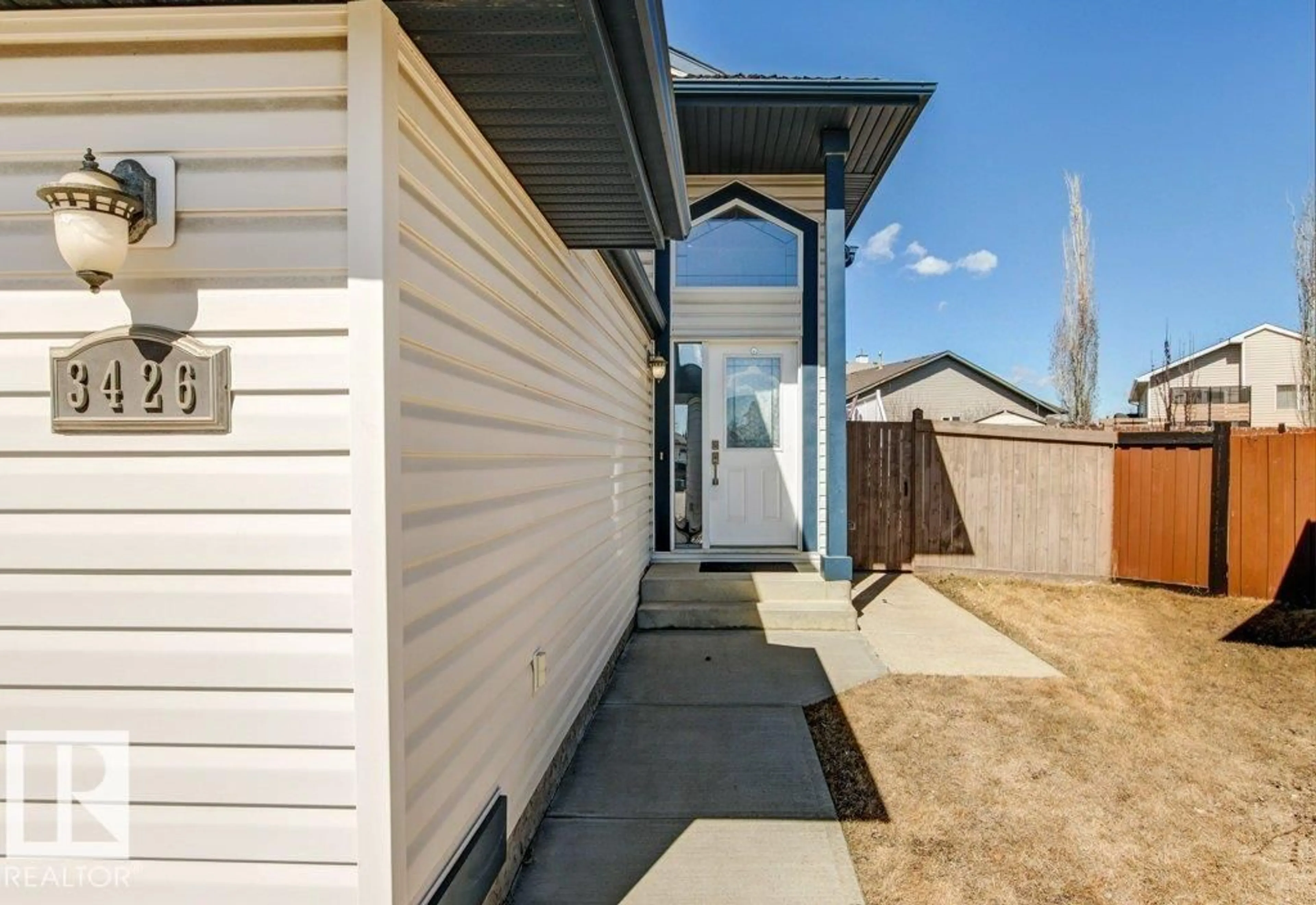 Home with vinyl exterior material, street for NW - 3426 21A ST, Edmonton Alberta T6T0B3