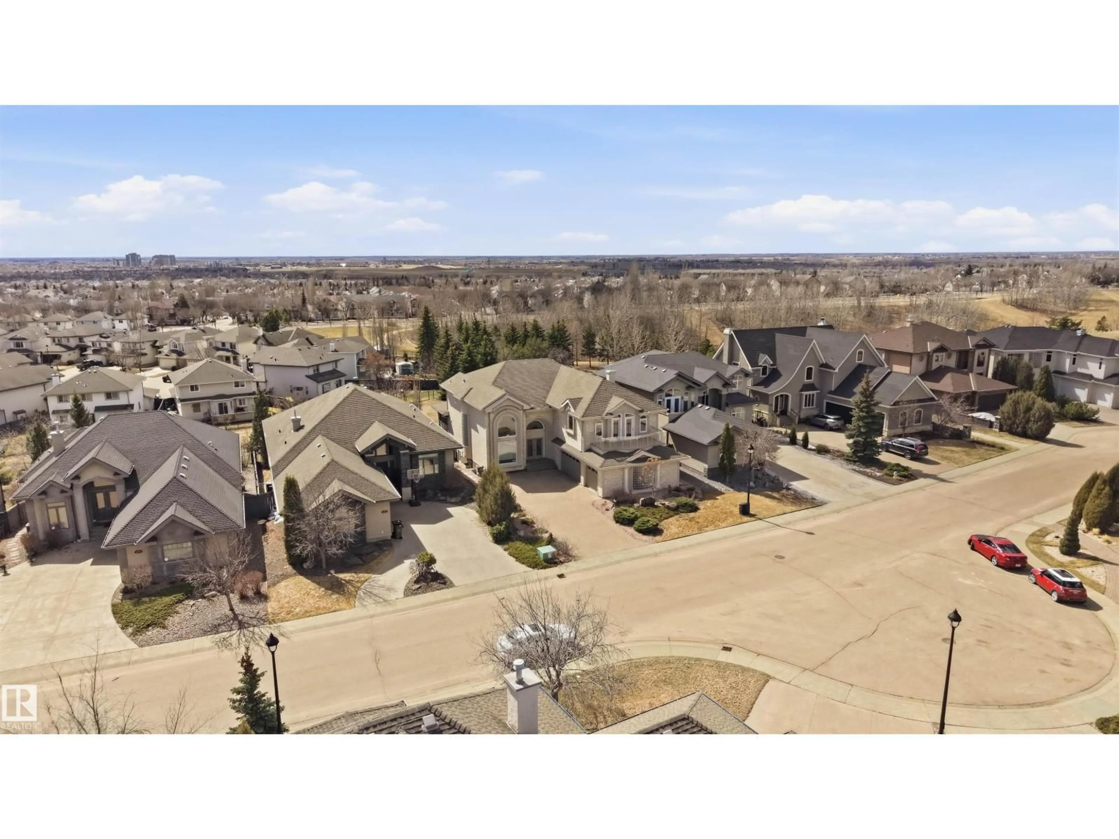 A pic from outside/outdoor area/front of a property/back of a property/a pic from drone, street for 2423 TEGLER GR, Edmonton Alberta T6R3K2