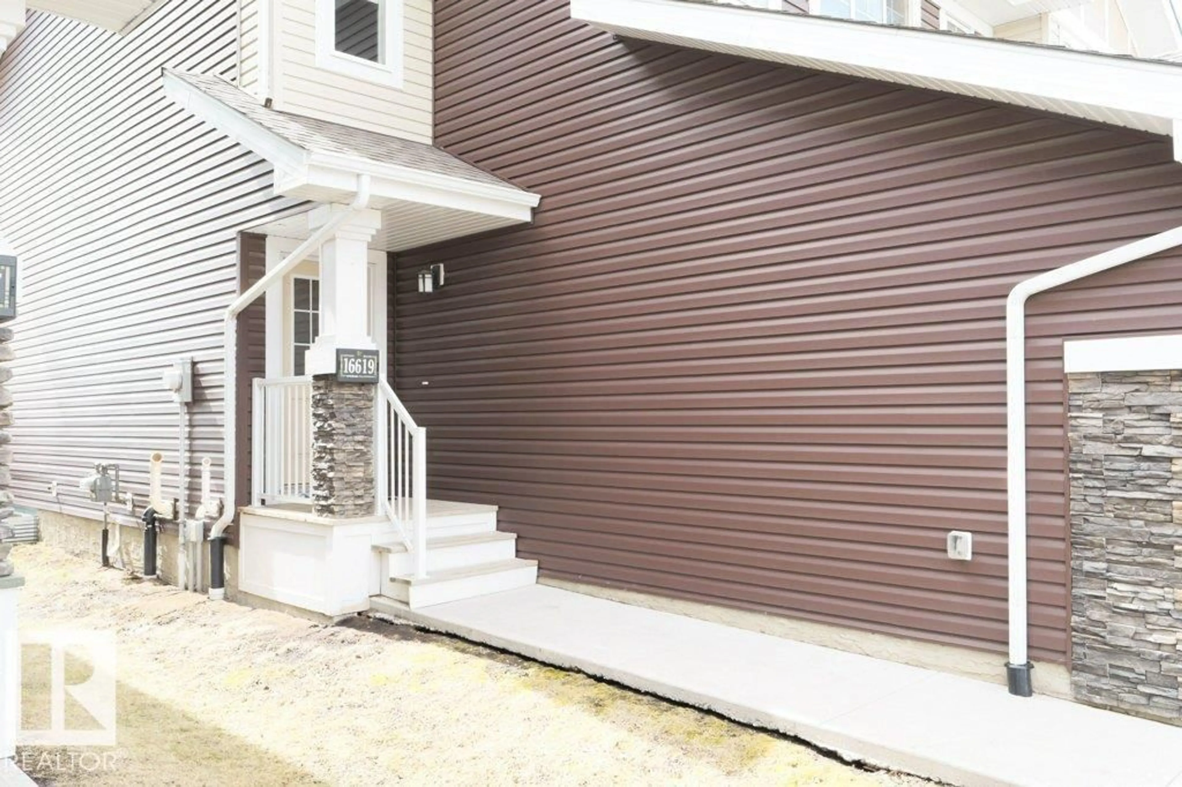 Home with vinyl exterior material, street for SW - 16619 14 AV, Edmonton Alberta T6W3C3