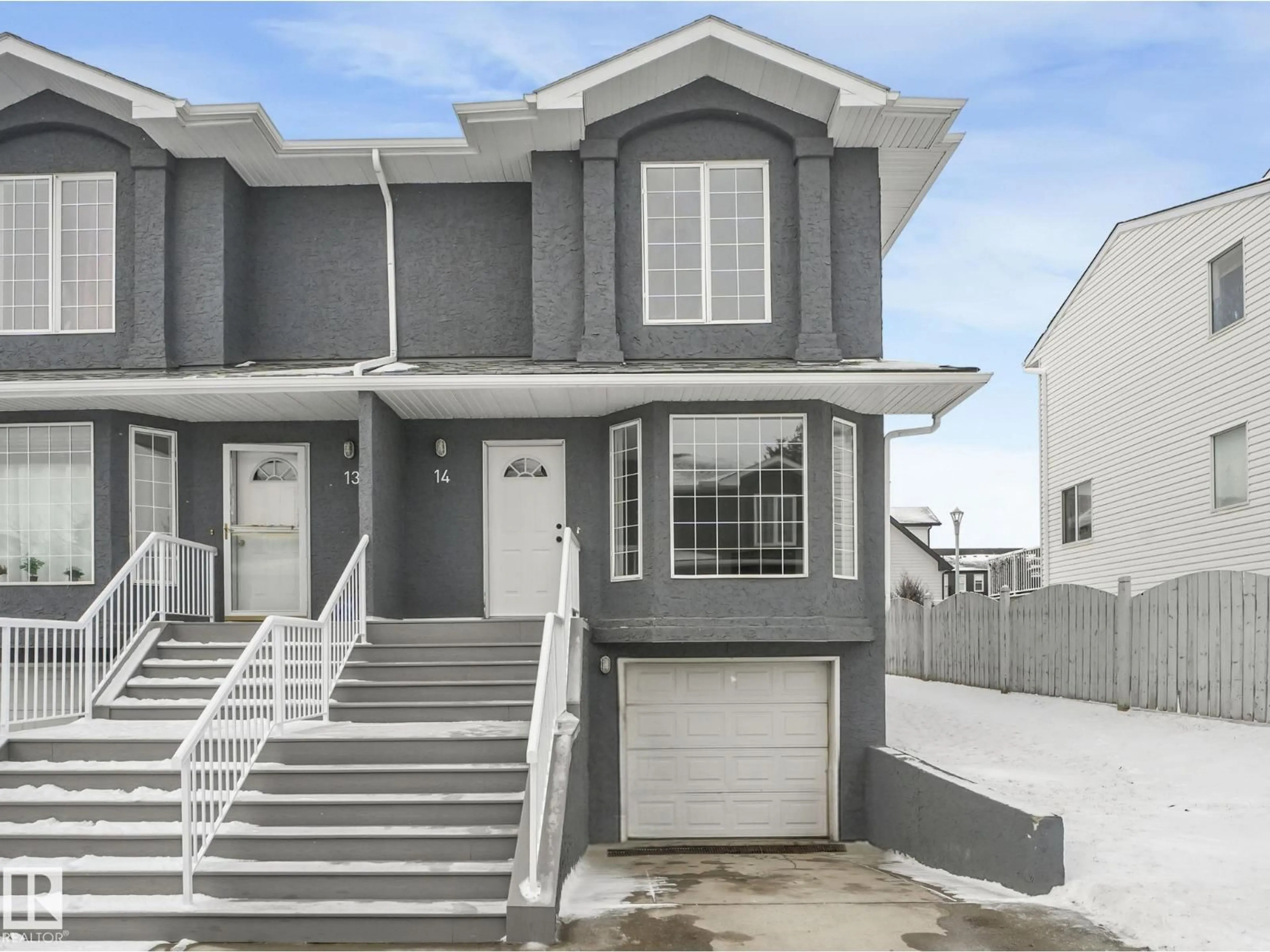 Home with vinyl exterior material, street for #14 - 15128 22 ST, Edmonton Alberta T5Y2W5