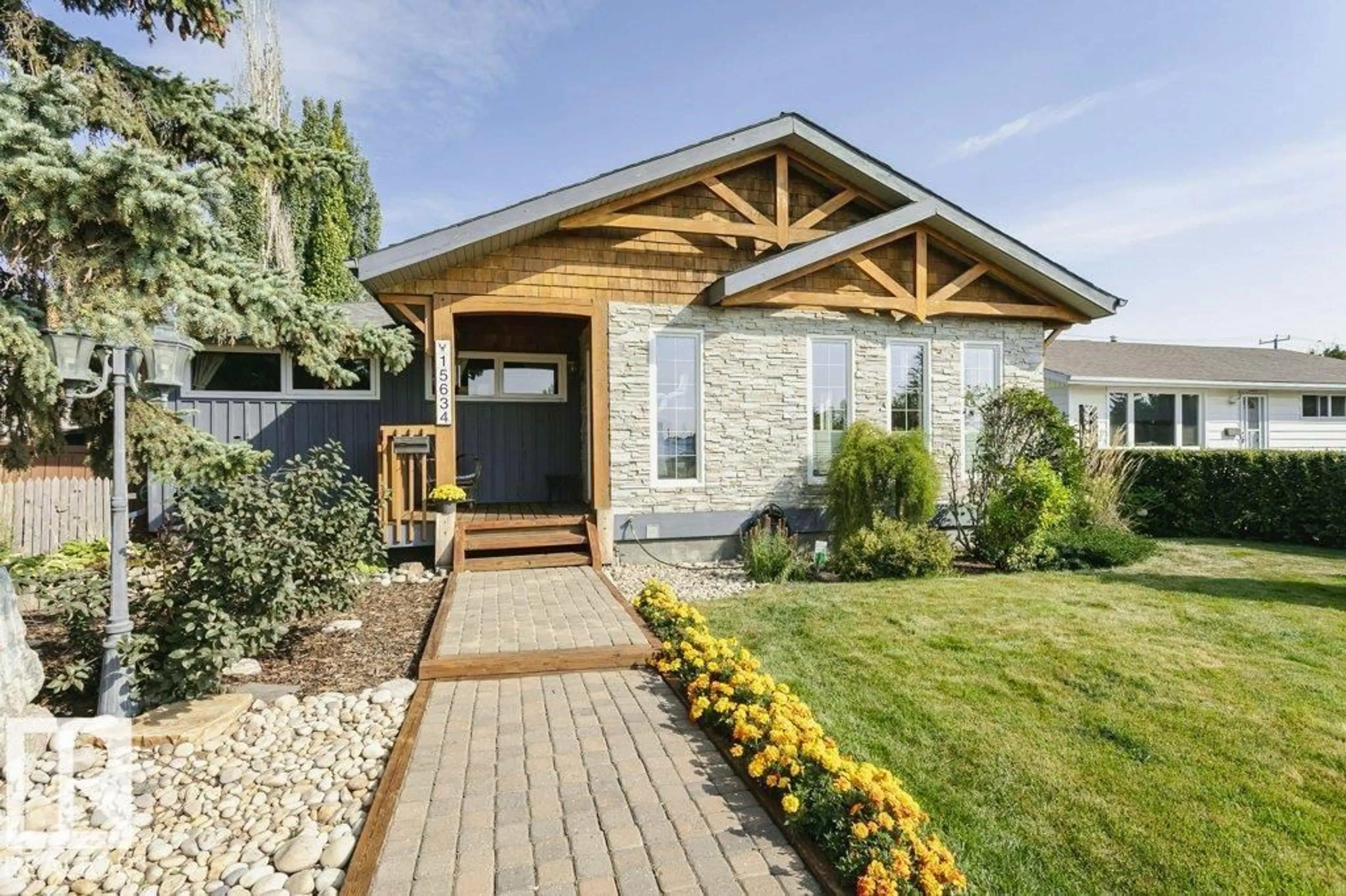 Home with brick exterior material, street for 15634 81 AV, Edmonton Alberta T5R3P4