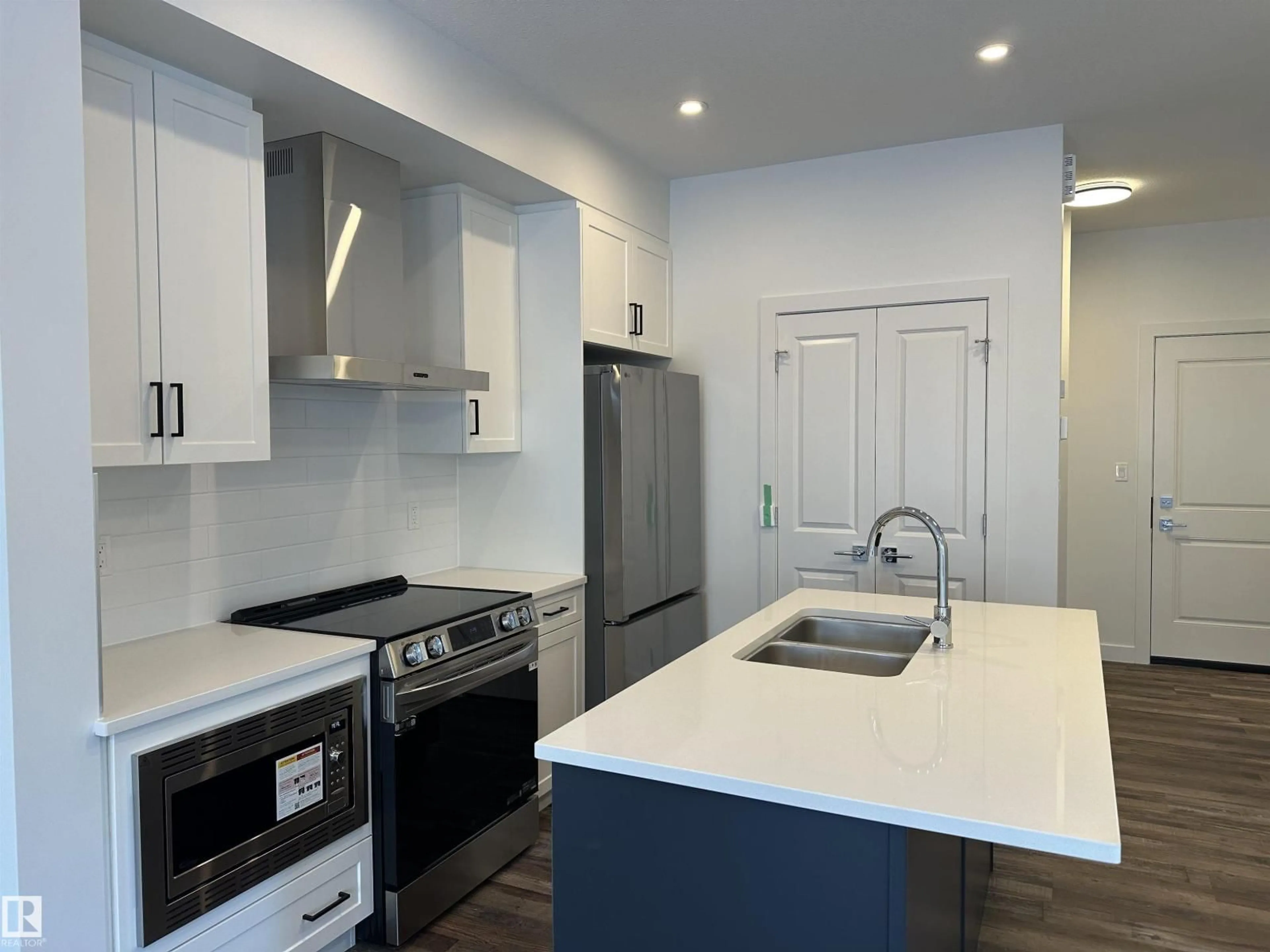 Open concept kitchen, unknown for #65 - 5122 213A ST NW, Edmonton Alberta T6M1M6