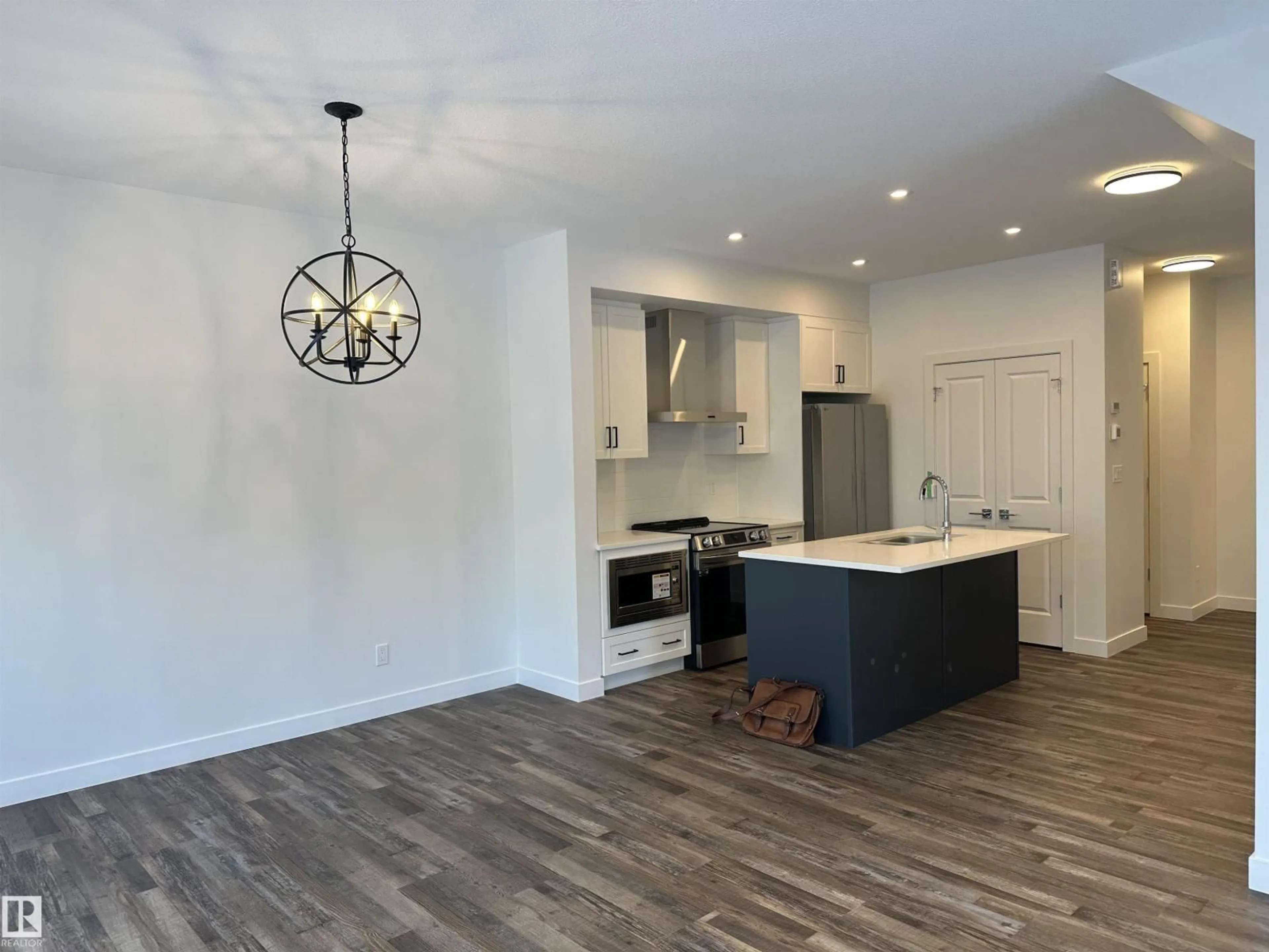 Open concept kitchen, unknown for #65 - 5122 213A ST NW, Edmonton Alberta T6M1M6