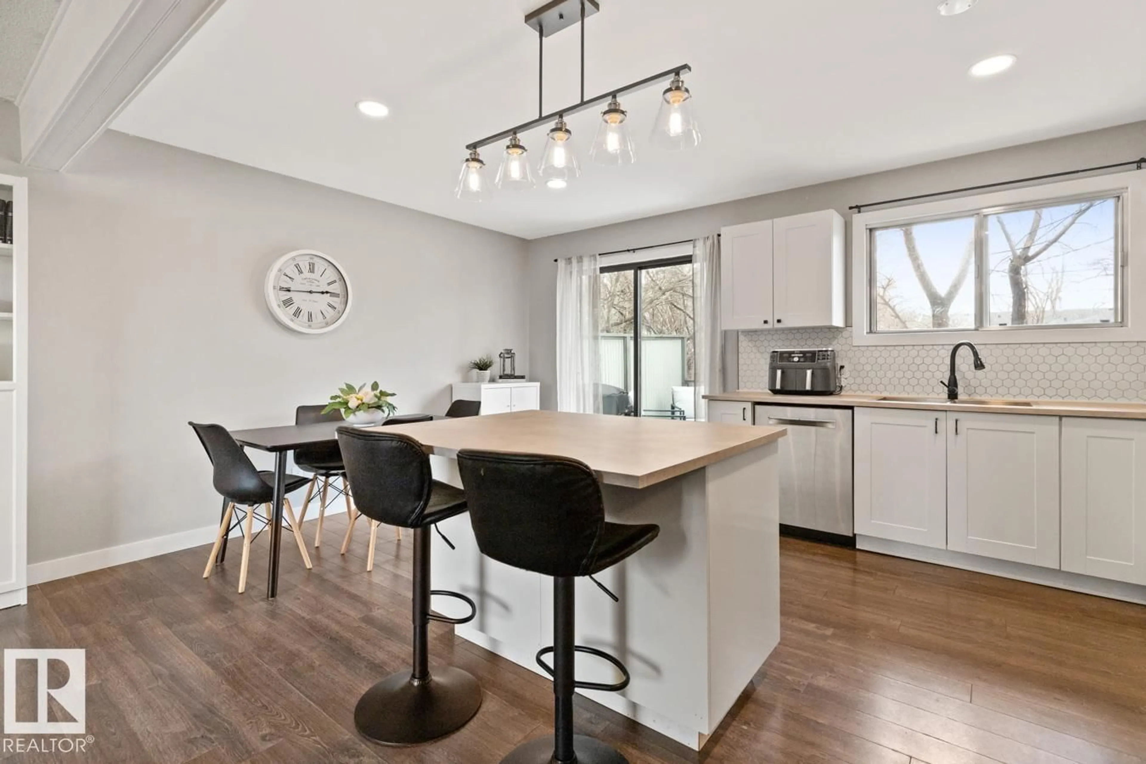 Open concept kitchen, wood/laminate floor for 20 CARAGANA AV, Sherwood Park Alberta T8A1W7