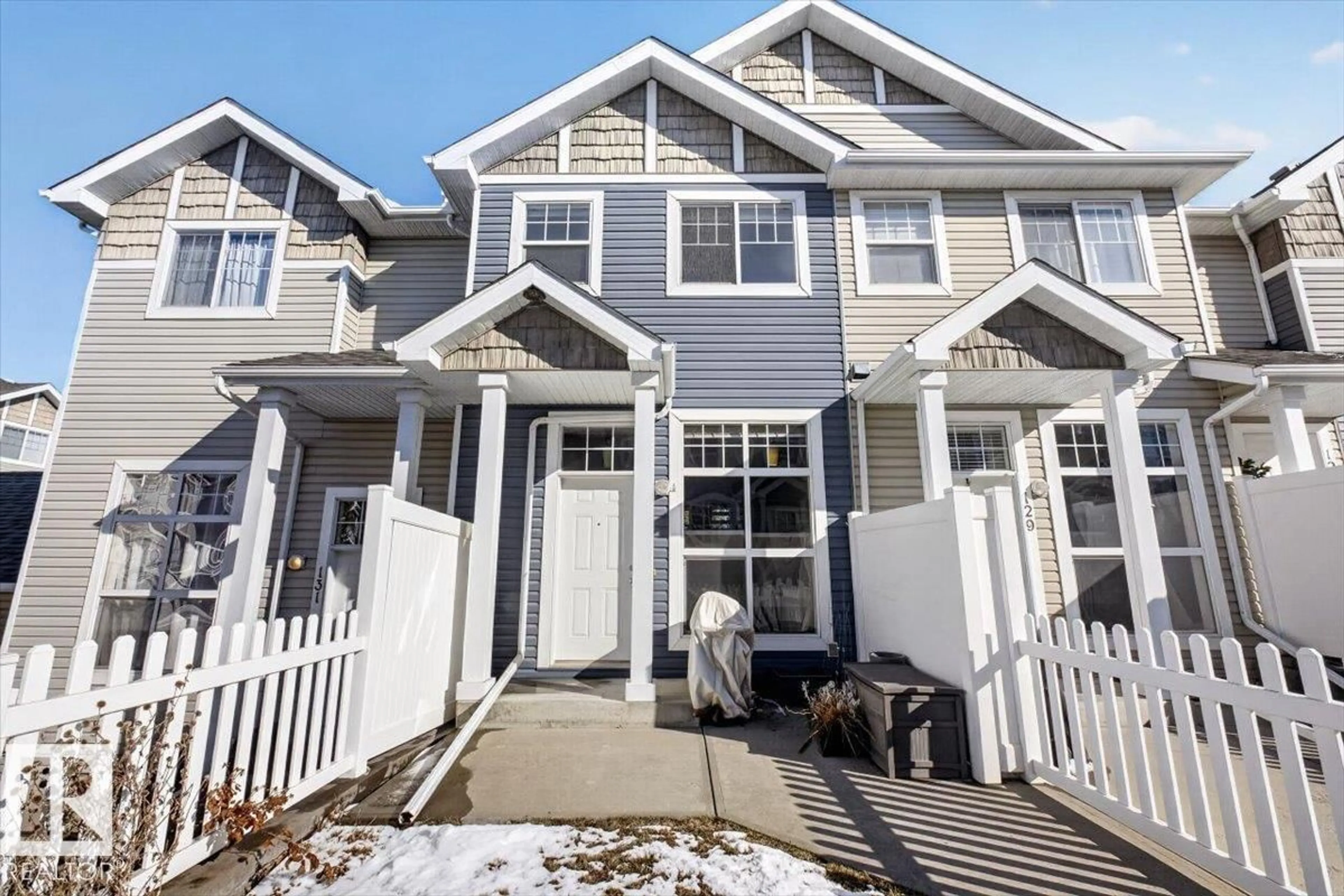 Home with vinyl exterior material, street for 130 5604 199 ST NW, Edmonton Alberta T6M2Z9