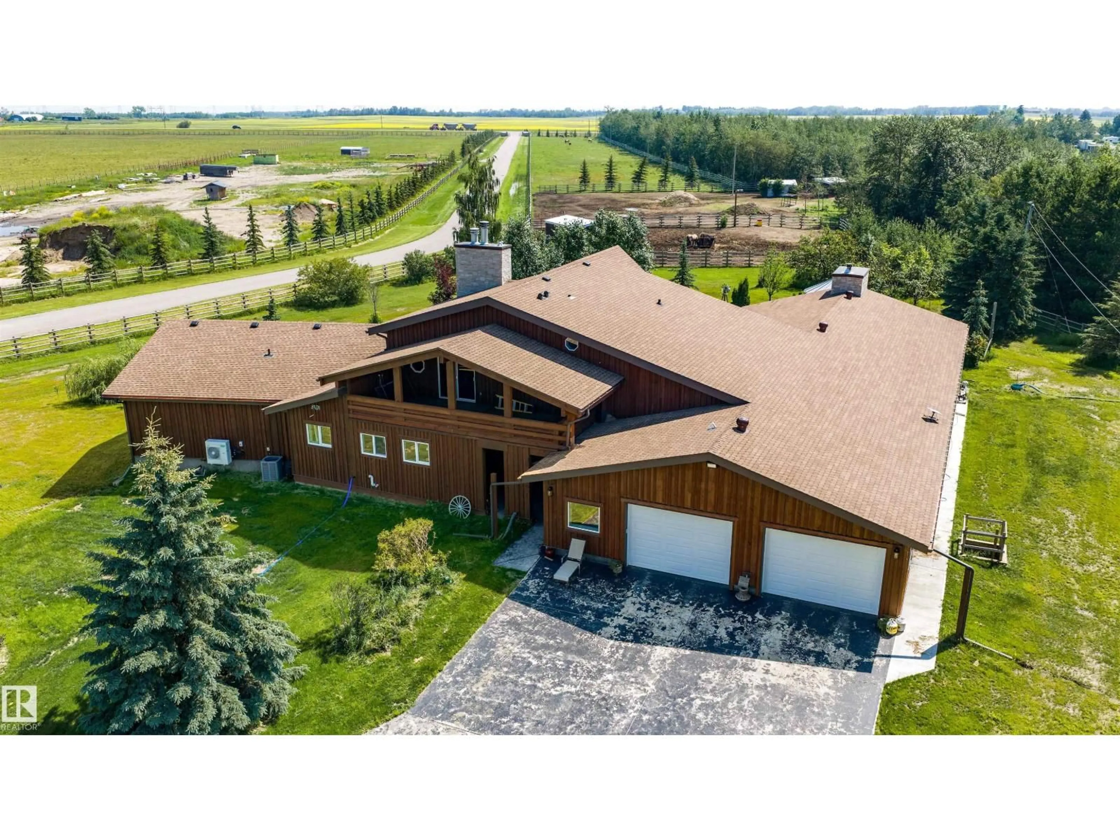 A pic from outside/outdoor area/front of a property/back of a property/a pic from drone, building for 55310 HWY 28 A, Rural Sturgeon County Alberta T8L5A4