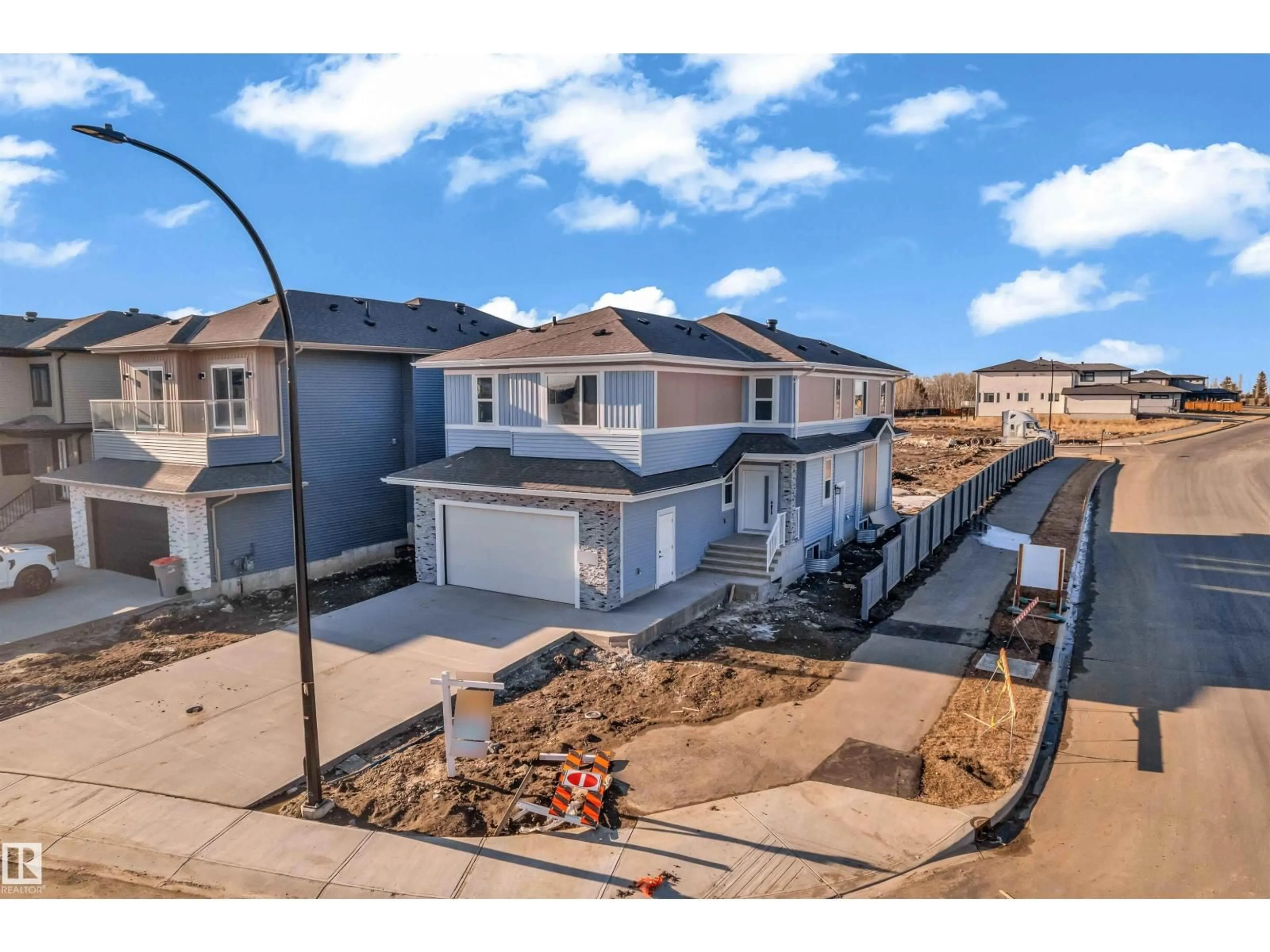 A pic from outside/outdoor area/front of a property/back of a property/a pic from drone, street for NE - 2420 63 AV, Rural Leduc County Alberta T4X3A6