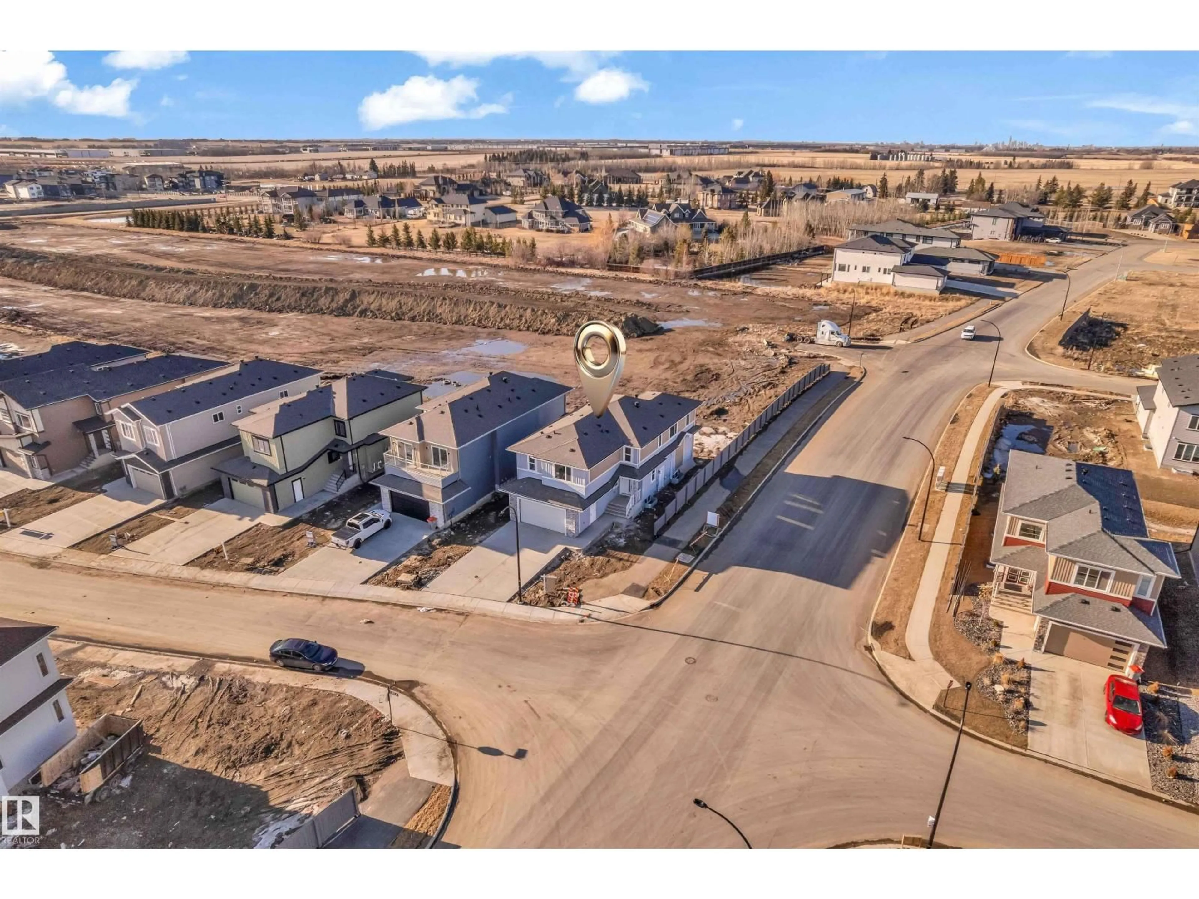 A pic from outside/outdoor area/front of a property/back of a property/a pic from drone, street for NE - 2420 63 AV, Rural Leduc County Alberta T4X3A6