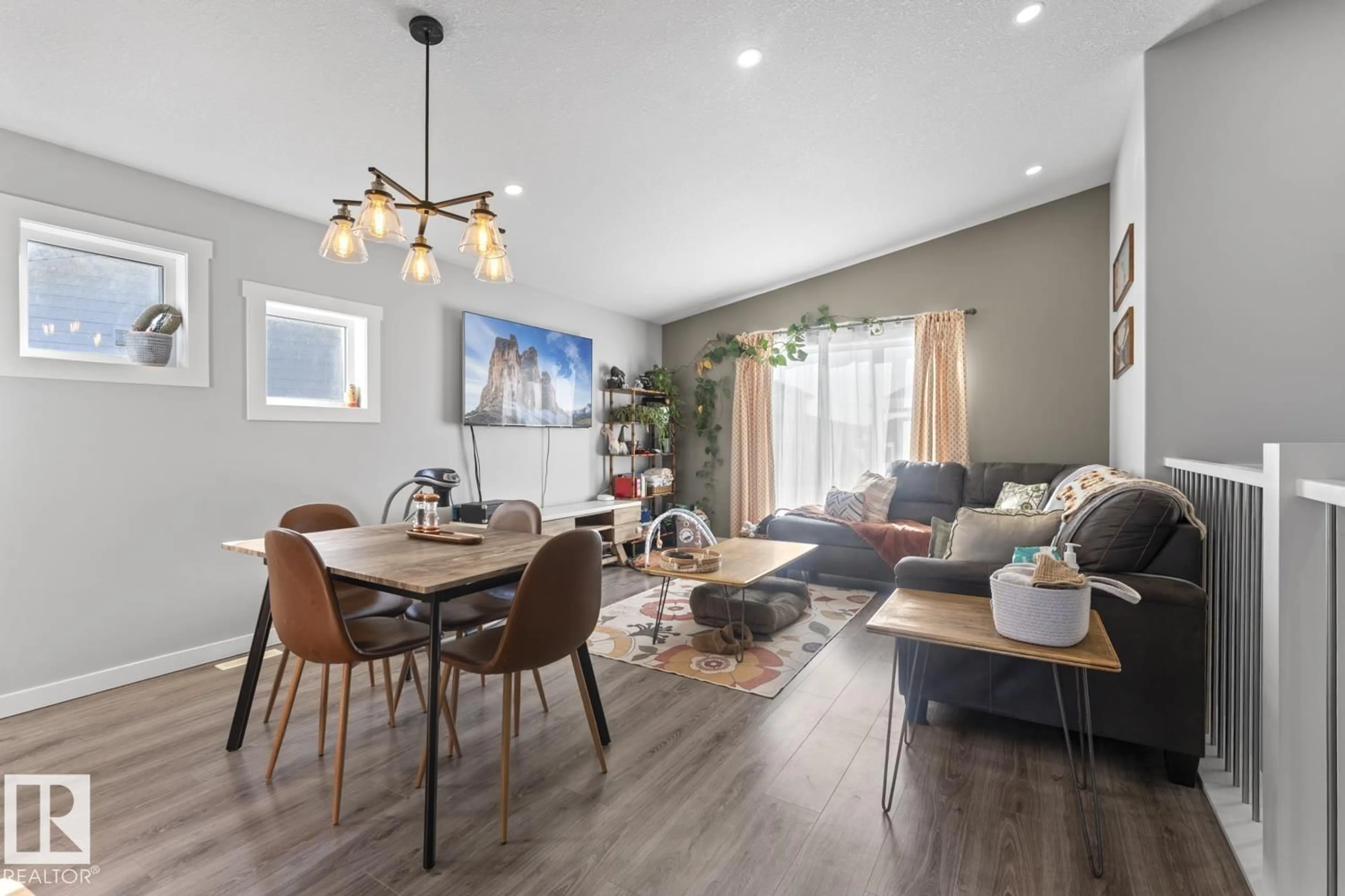 Living room with furniture, wood/laminate floor for 404 LAKEWOOD WY, Cold Lake Alberta T9M0K7