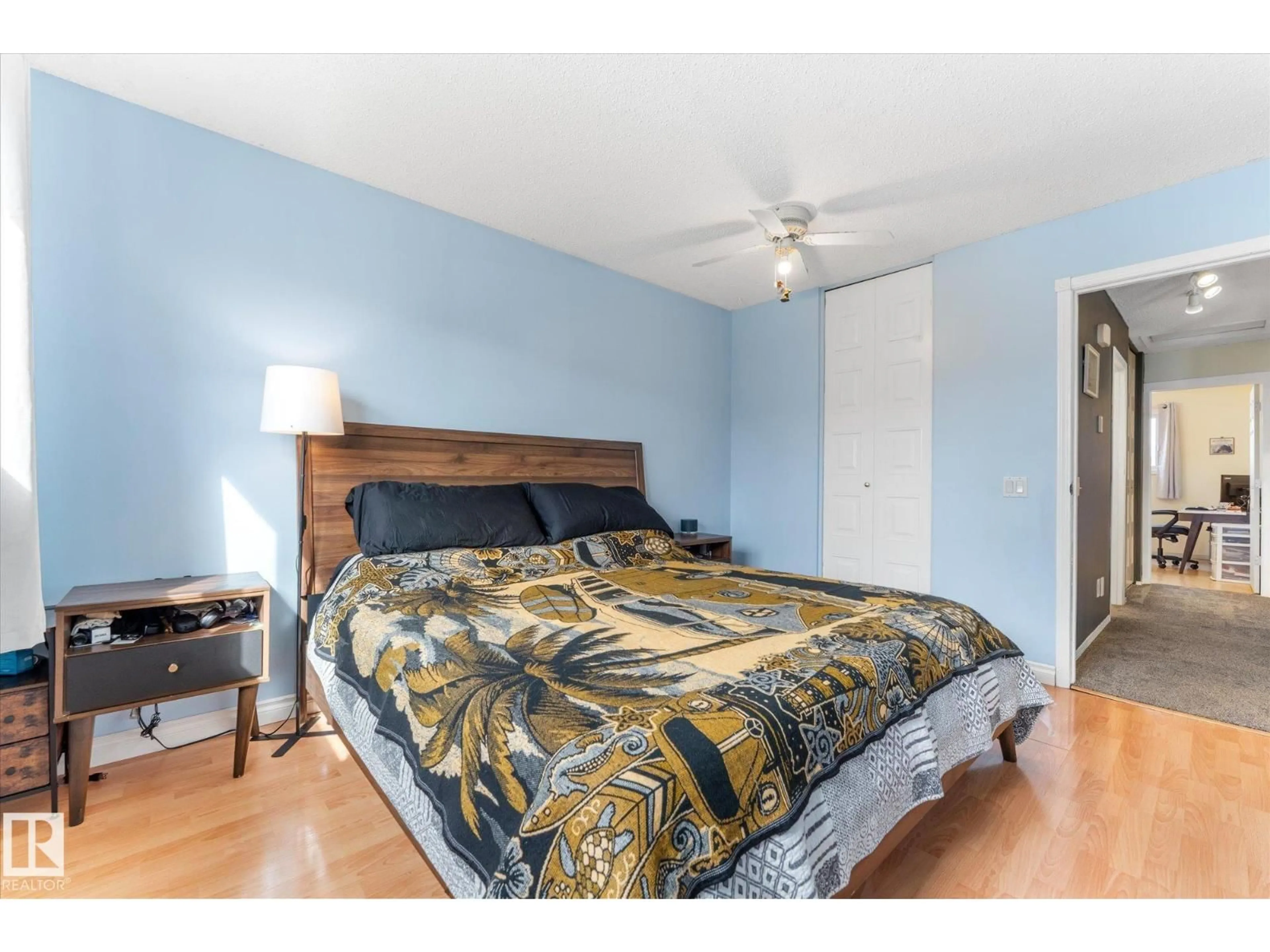 Bedroom with bed, wood/laminate floor for 33 WELLINGTON CR, Spruce Grove Alberta T7X1K3