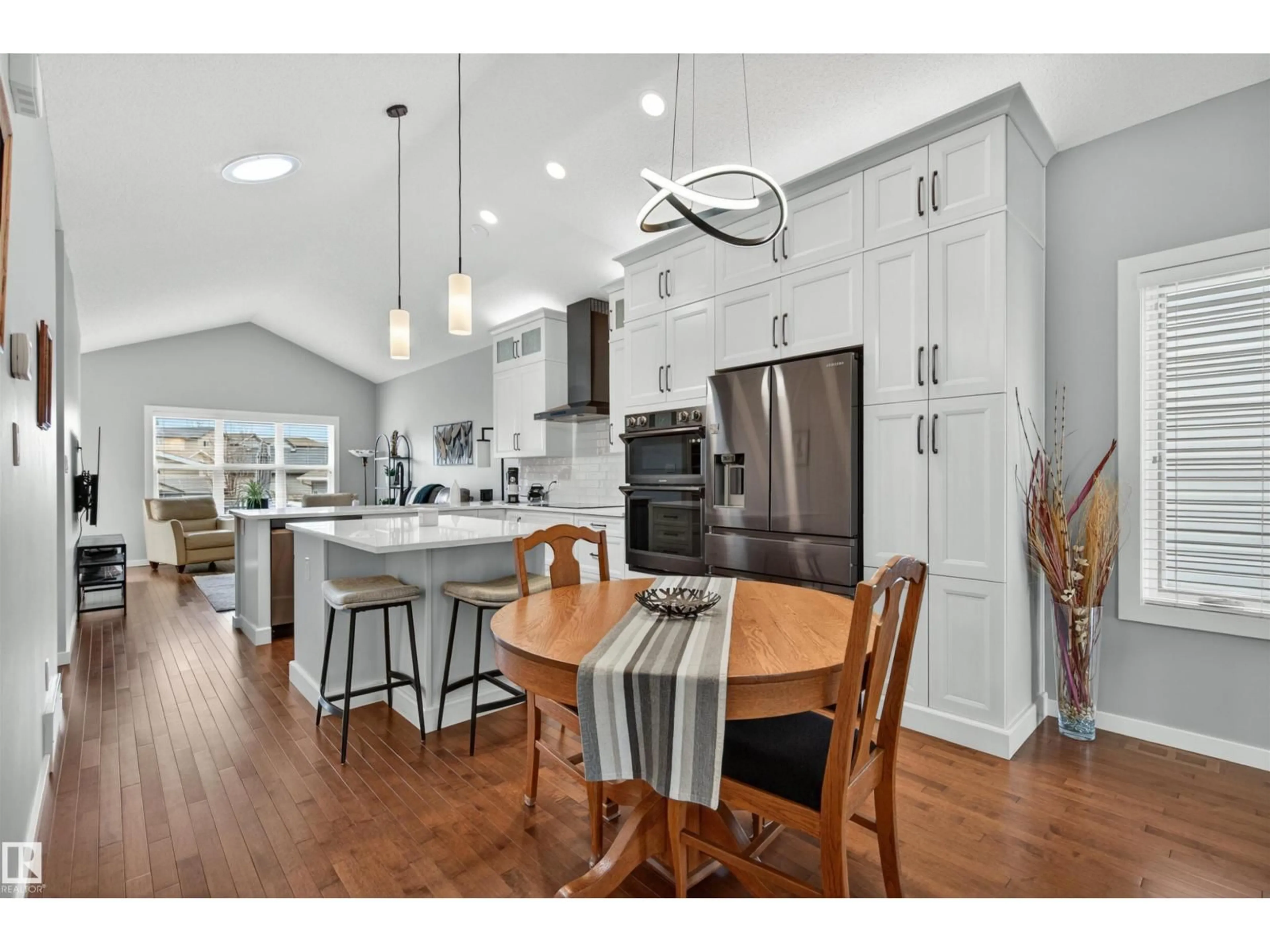 Open concept kitchen, wood/laminate floor for 6808 CARDINAL LI, Edmonton Alberta T6W1Y9