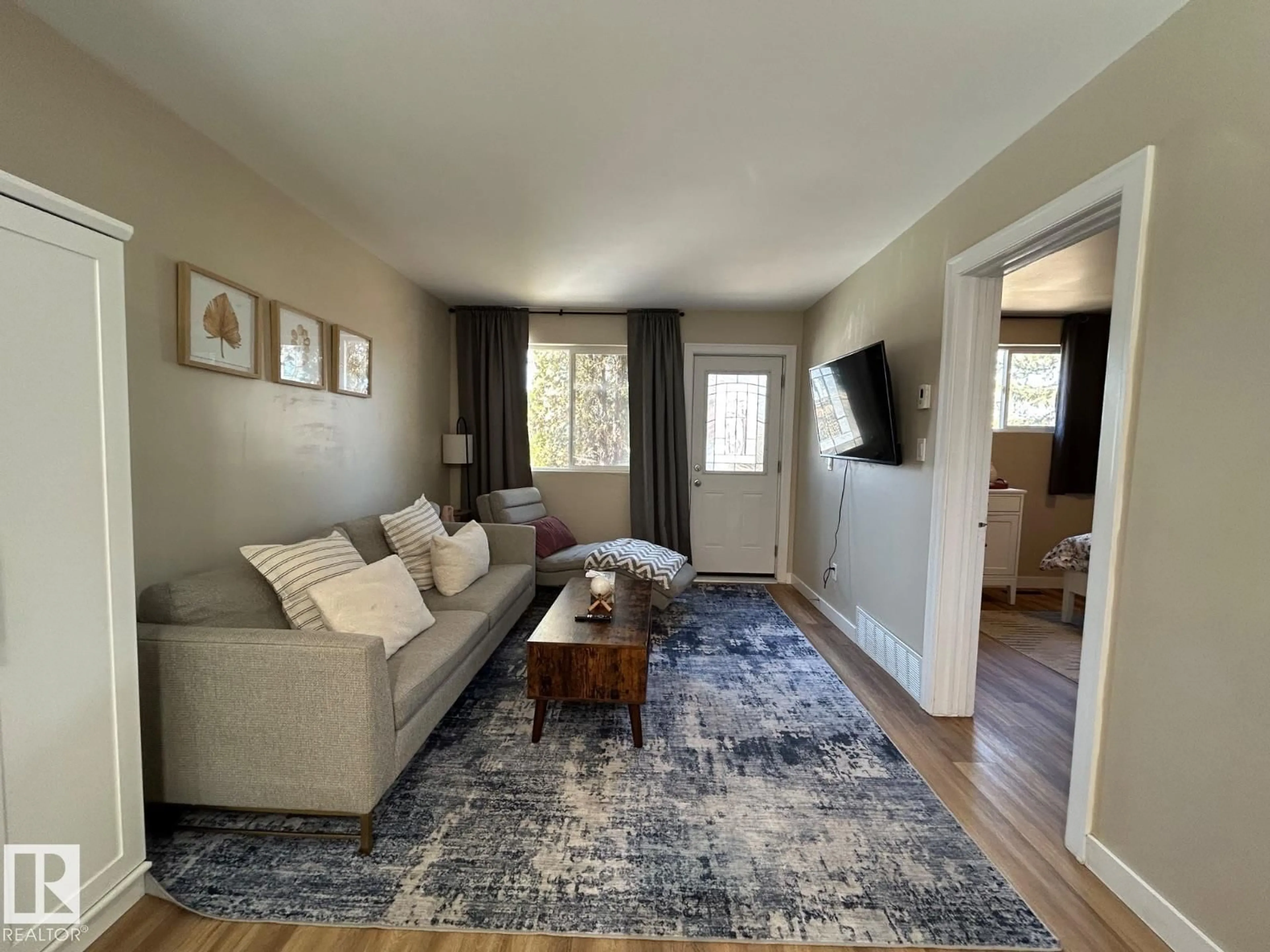 Living room with furniture, unknown for 11017 38 ST NW, Edmonton Alberta T5W2E7
