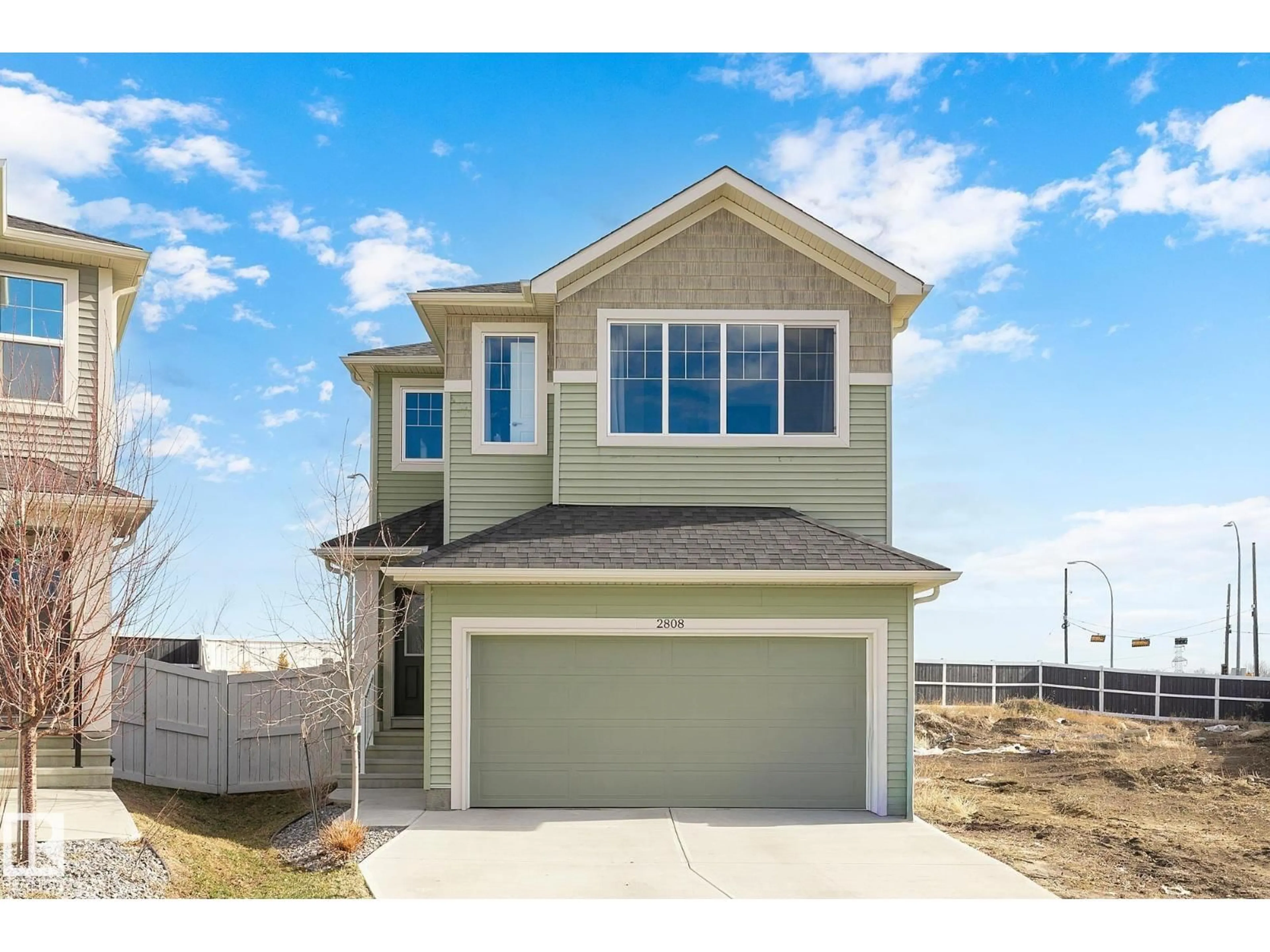 Home with vinyl exterior material, water/lake/river/ocean view for 2808 152 AV, Edmonton Alberta T5Y3Y8