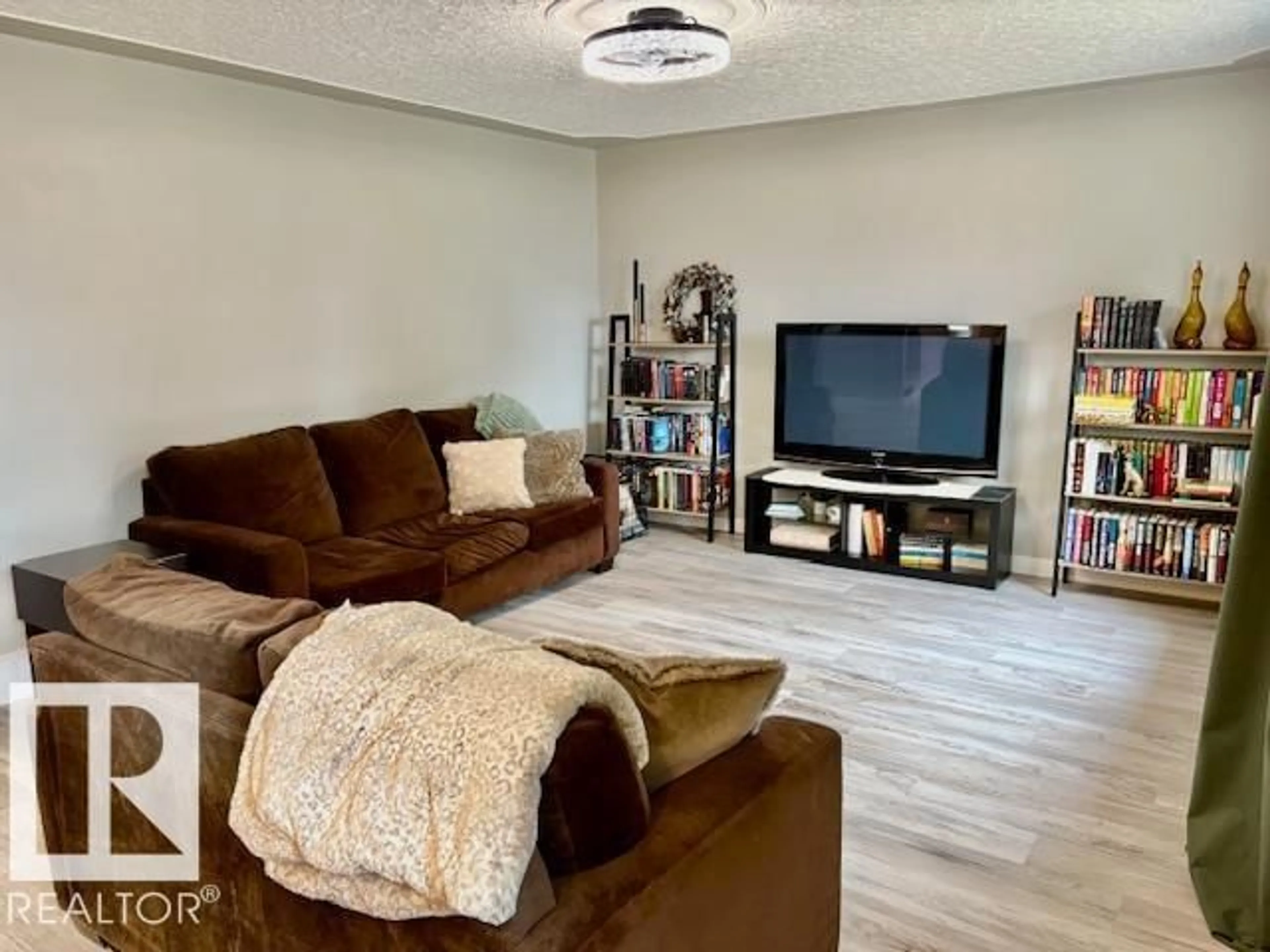 Living room with furniture, unknown for 5626 49A ST, Vegreville Alberta T9C1K4