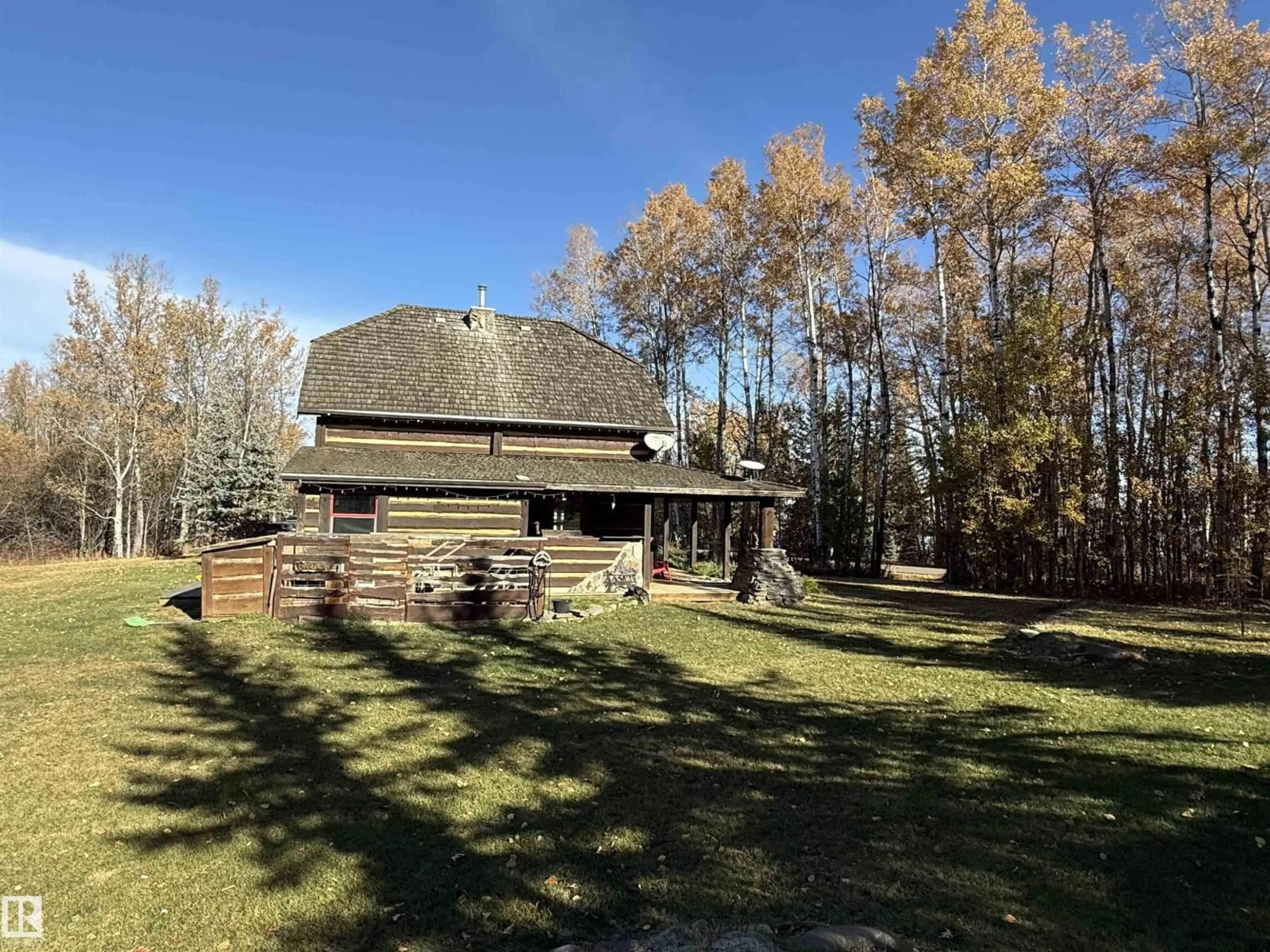 A pic from outside/outdoor area/front of a property/back of a property/a pic from drone, unknown for 580 POPLAR BAY DRIVE, Rural Wetaskiwin County Alberta T0C2V0