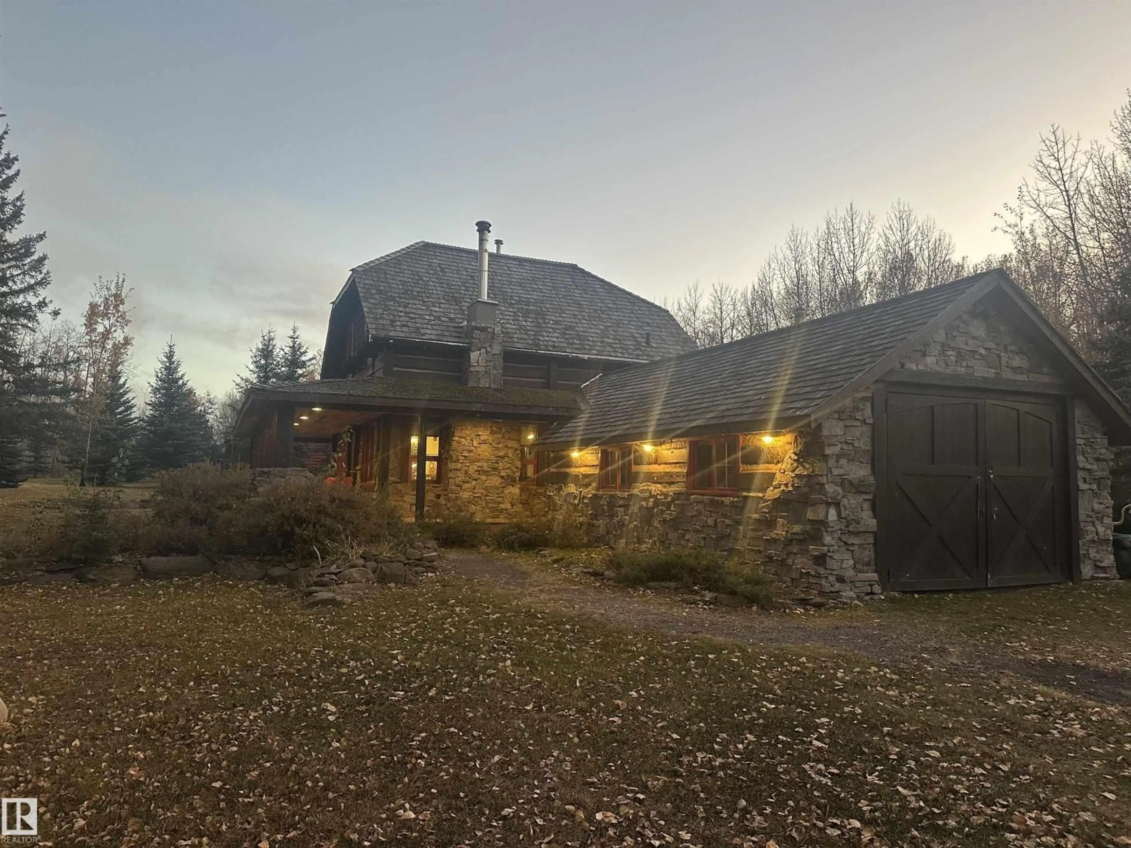 A pic from outside/outdoor area/front of a property/back of a property/a pic from drone, building for 580 POPLAR BAY DRIVE, Rural Wetaskiwin County Alberta T0C2V0