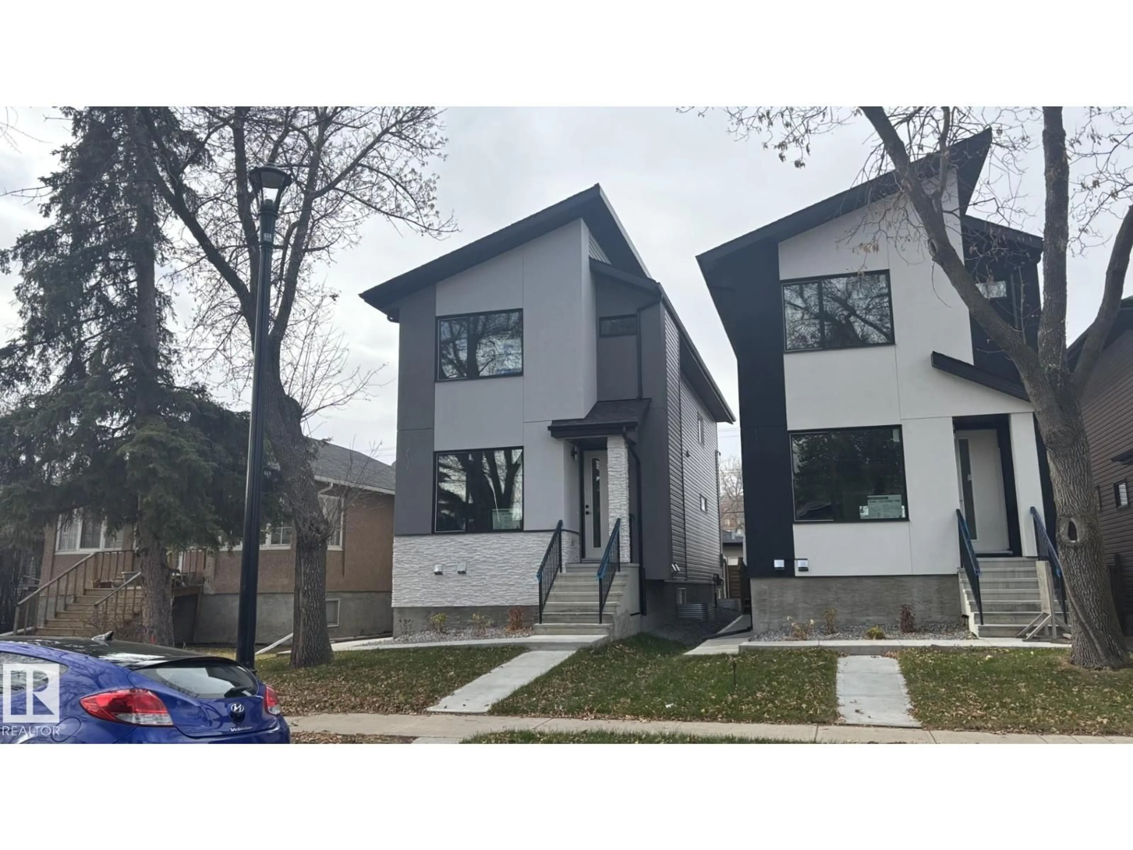 Home with brick exterior material, street for 11138 126 ST, Edmonton Alberta T5M0P9