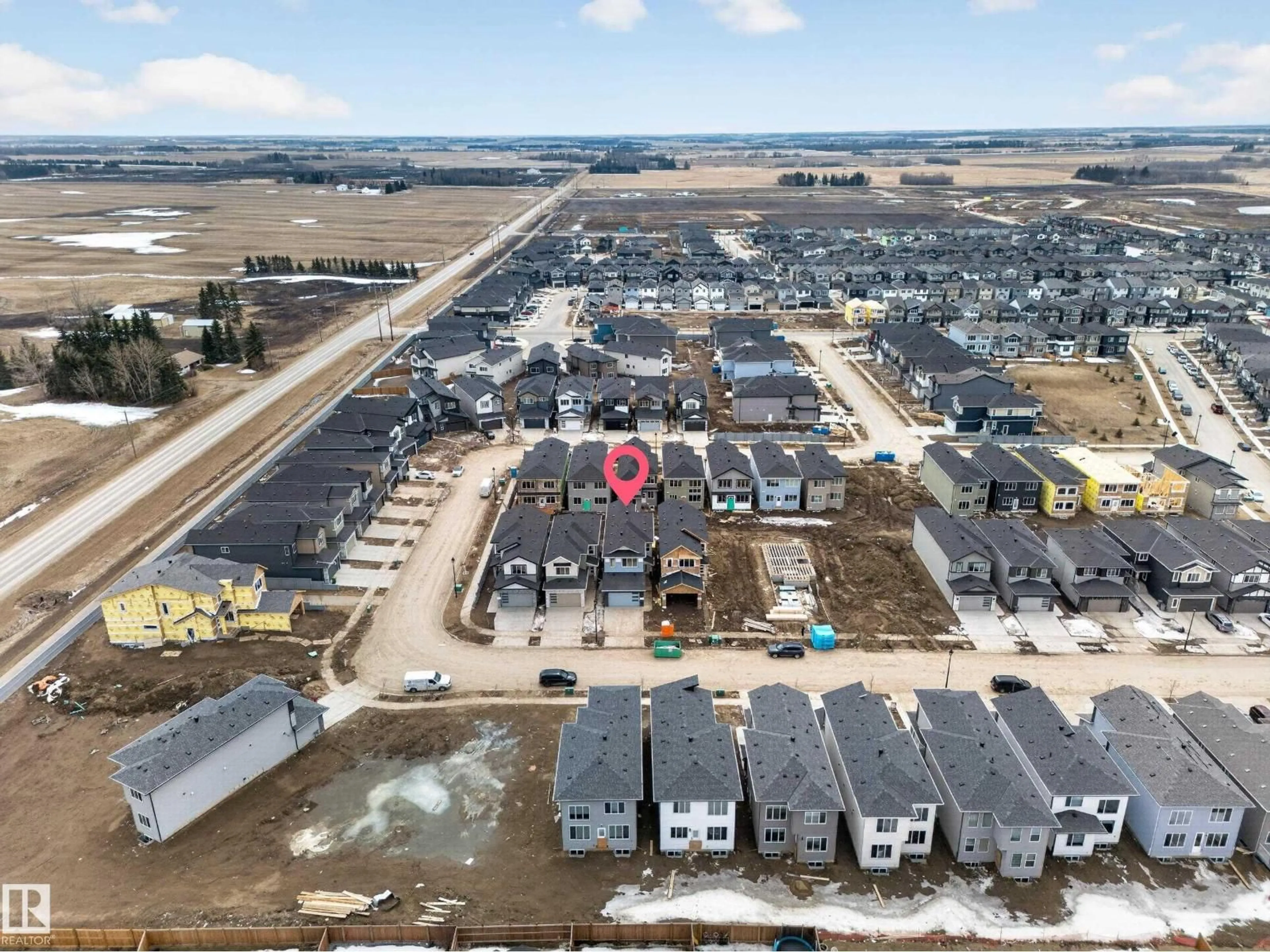 A pic from outside/outdoor area/front of a property/back of a property/a pic from drone, unknown for 3507 45 AV, Beaumont Alberta T4X3G9