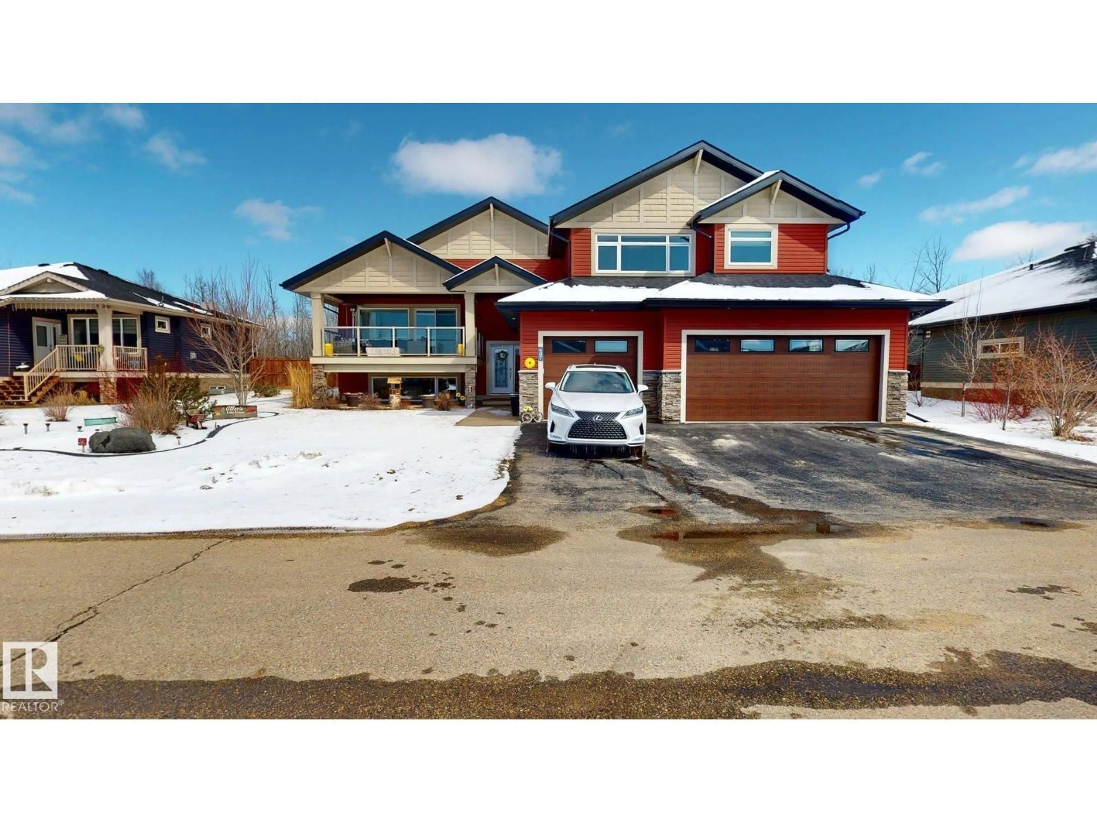 A pic from outside/outdoor area/front of a property/back of a property/a pic from drone, street for 55101 - 607 STE. ANNE TR, Rural Lac Ste. Anne County Alberta T0E1A1