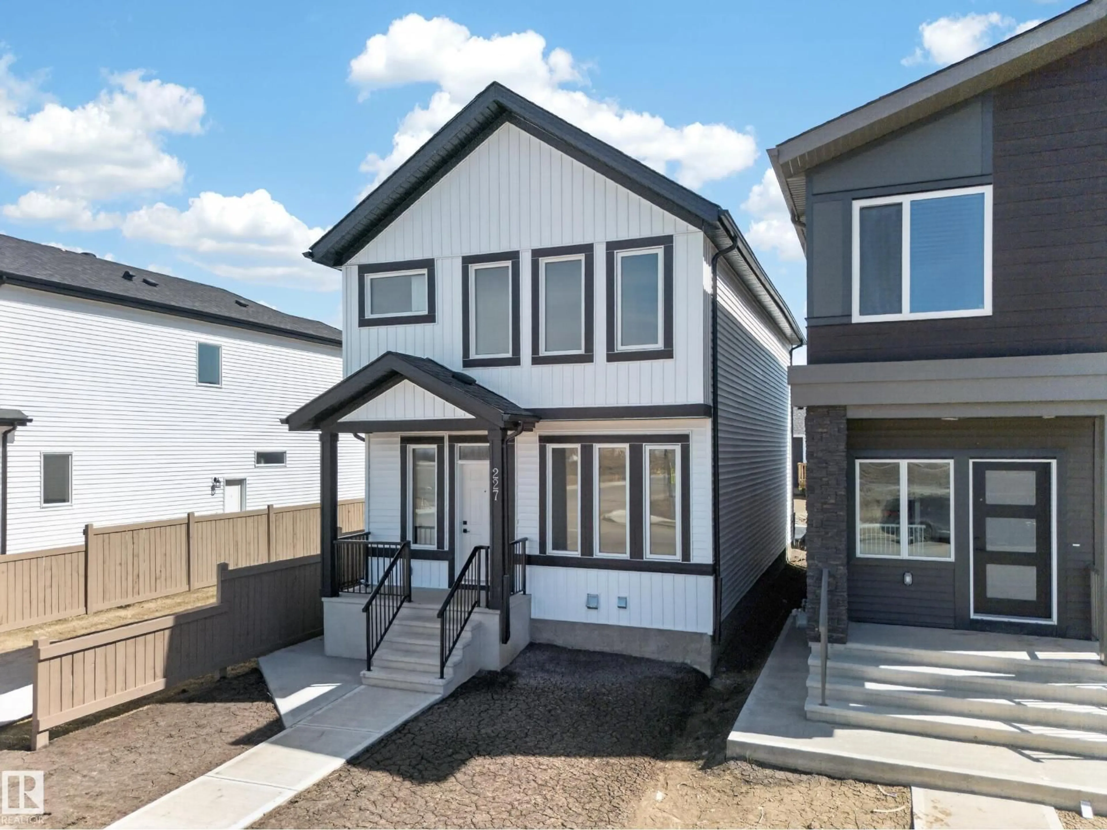Home with vinyl exterior material, street for 227 DEER VALLEY DR, Leduc Alberta T9E1S8