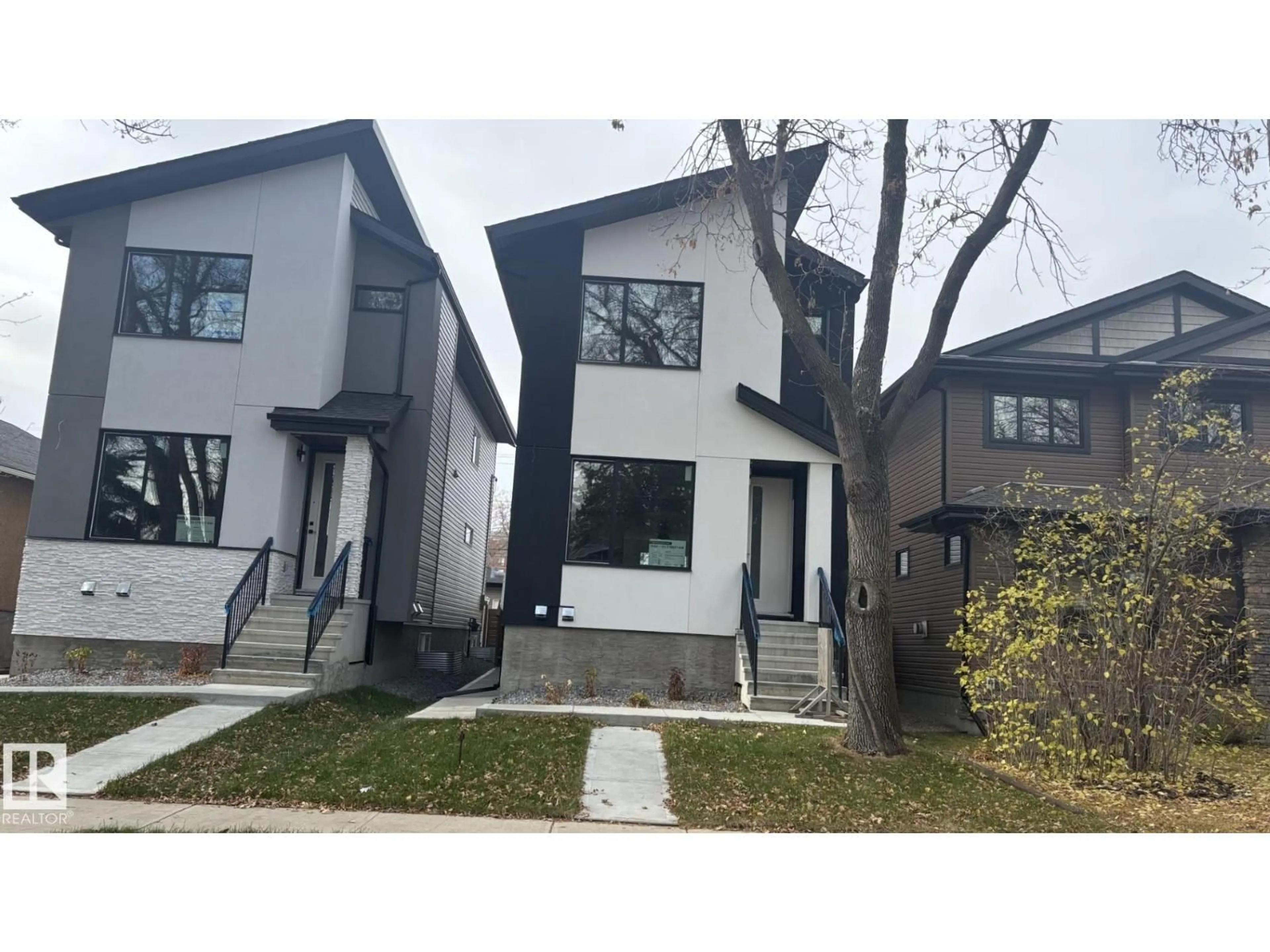 Home with vinyl exterior material, street for E NW - 11140 126 ST, Edmonton Alberta T5M0P9