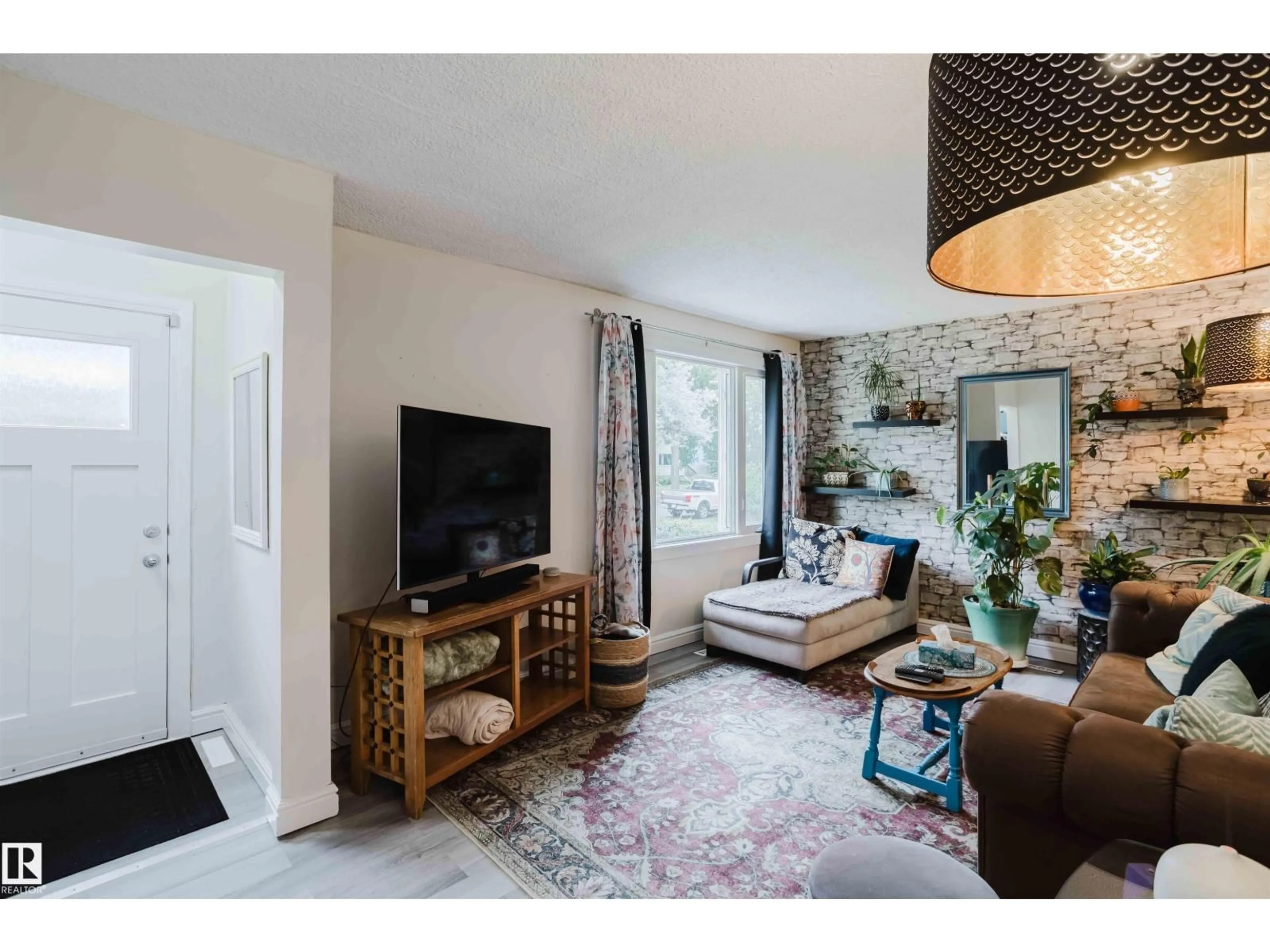 Living room with furniture, unknown for 12026 104 ST, Edmonton Alberta T5G2L4